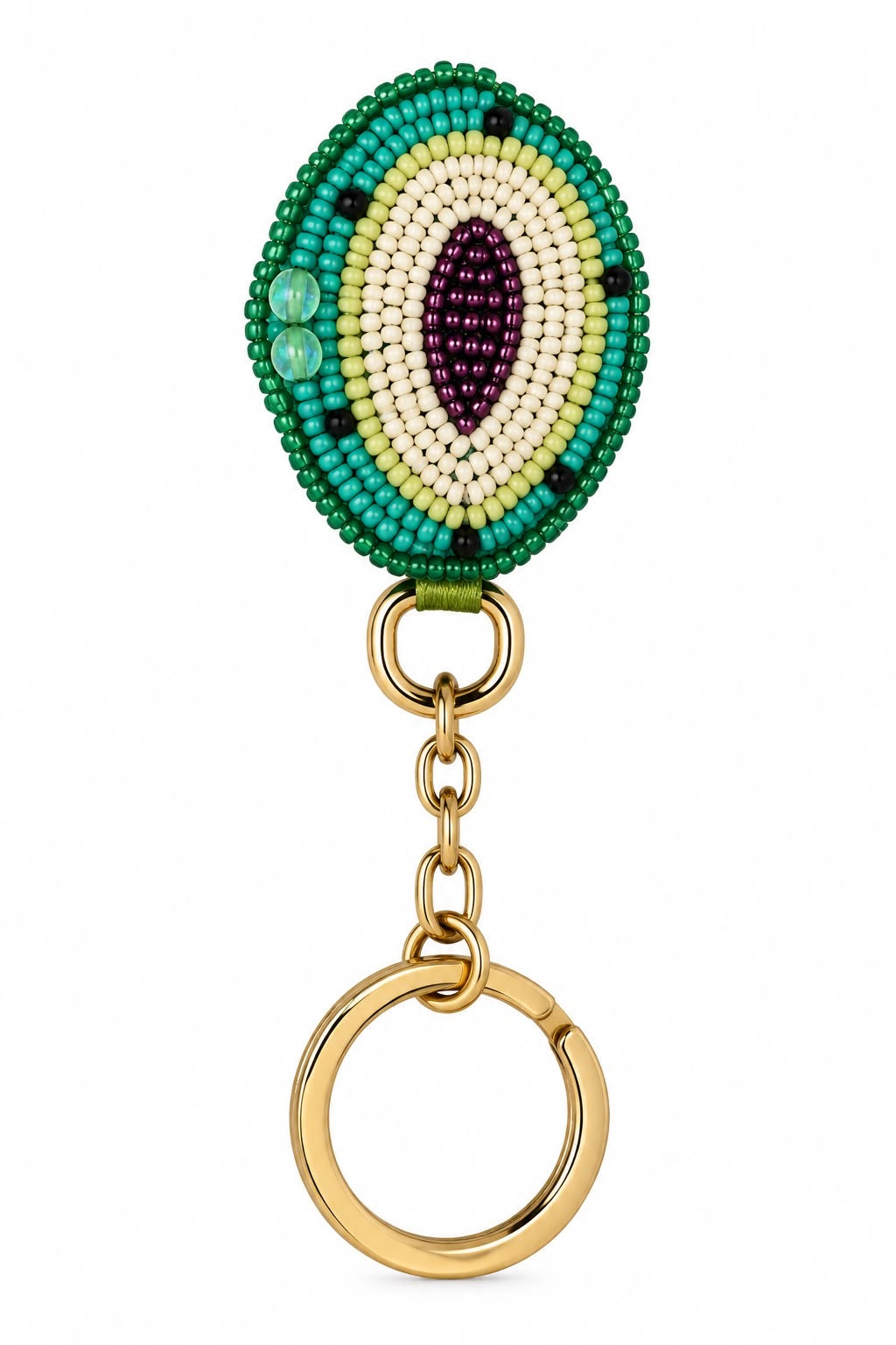 Piti Cuiti sliced kiwi bag charm in green and cream beads with a purple seed centre