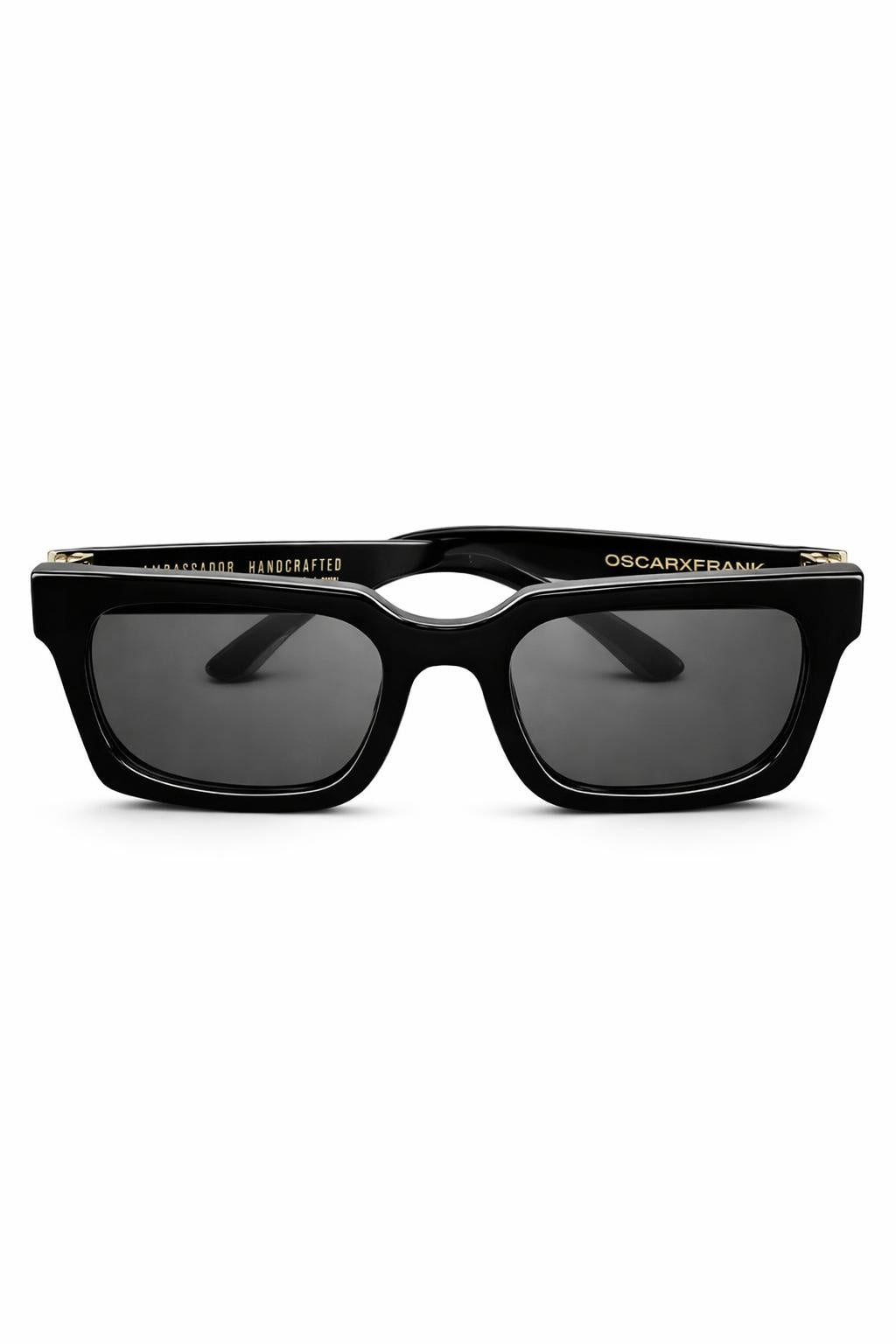 Shop Oscar x Frank Ambassador sunglasses at Boetiek. Polarised gloss black frames handcrafted with bold rectangular styling and refined modern design.