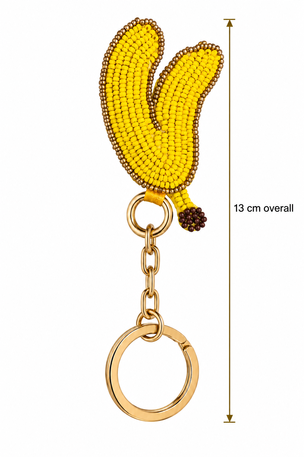 Piti Cuiti banana bag charm shown at 13 cm overall length including the gold tone ring