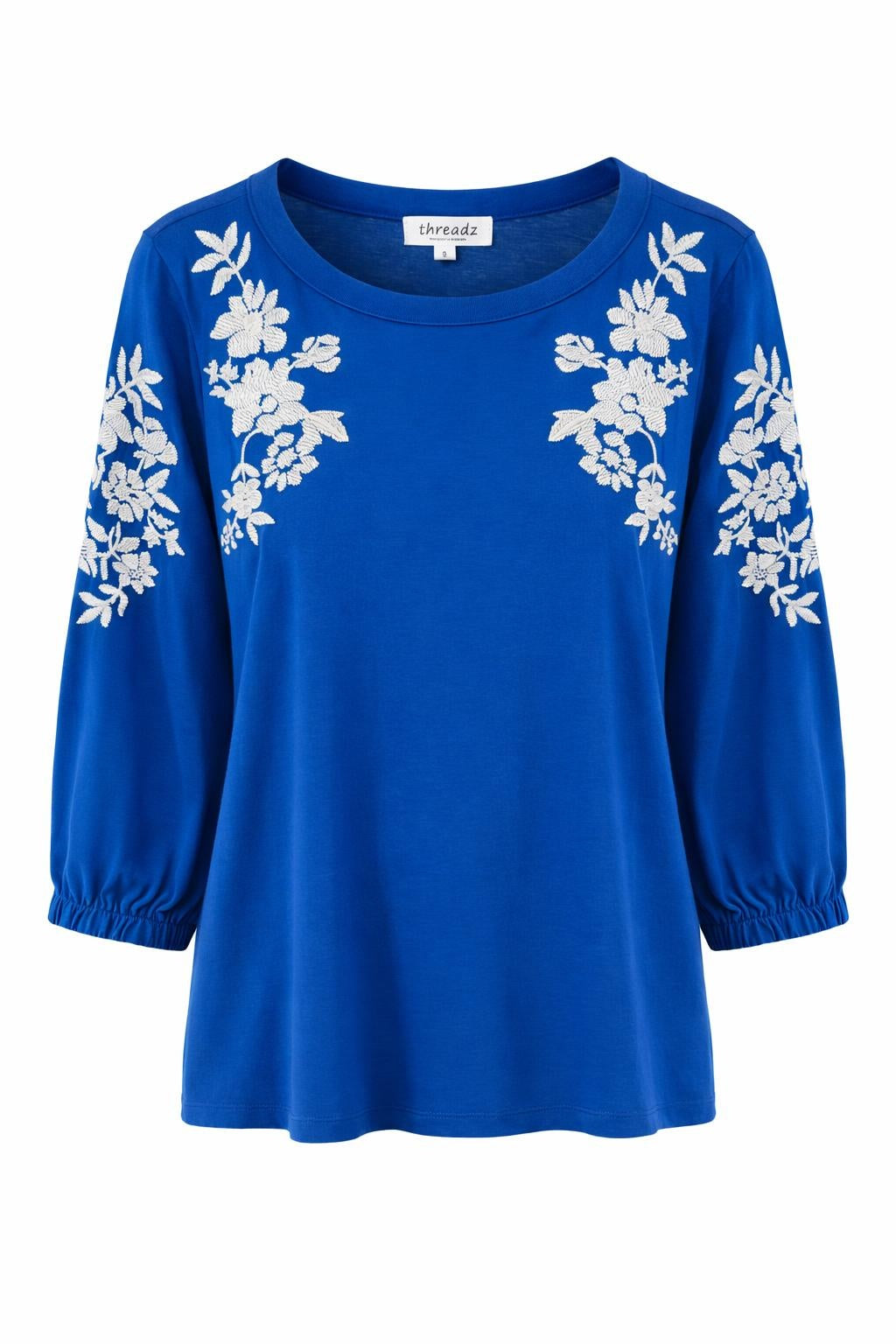 Threadz cobalt blue embroidered tee with white floral detail and 3/4 sleeves front
