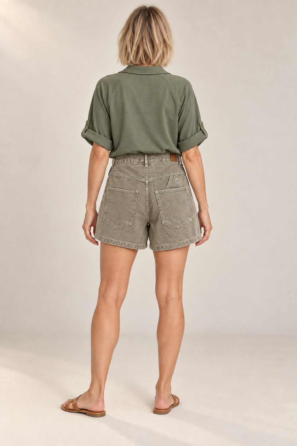 Model wearing the Mado Short in Cobblestone from the back