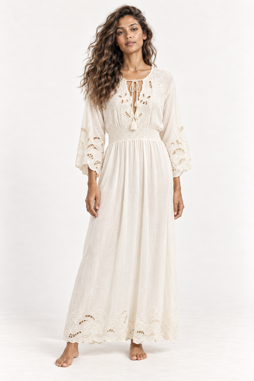 Model wearing the Piti Cuiti tassel tie cutwork maxi dress in ecru, full length front view