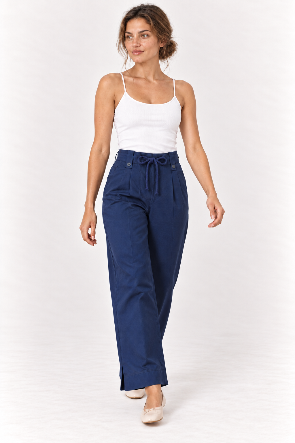 Model walking in the YAYA Drawstring Wide Leg Trousers in Navy Blazer Blue, showing the wide leg #Colour_Dark Blue