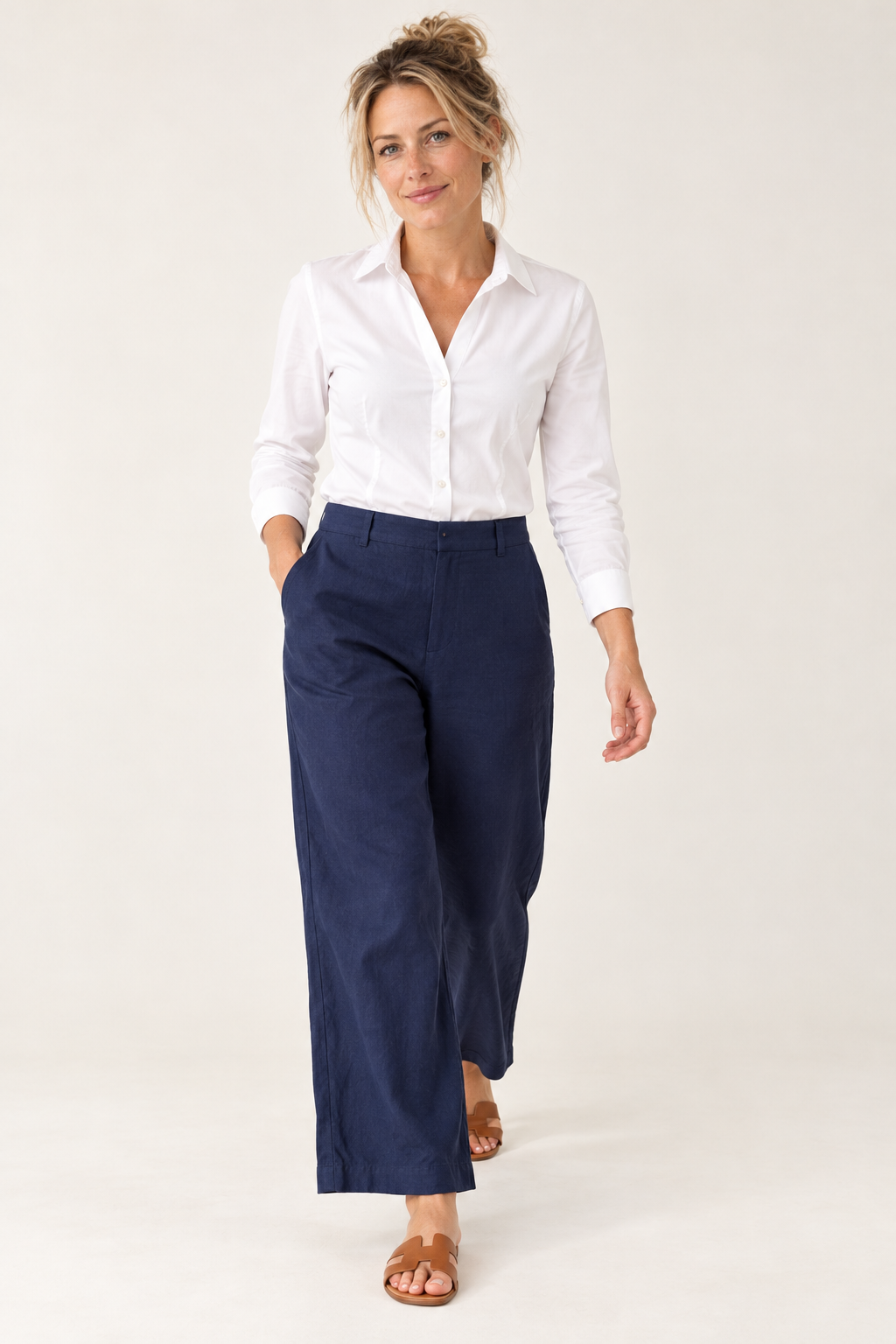 Gordon Smith Lino Wide Leg Pant in Navy in movement, styled with the Emma Rib Shirt in White