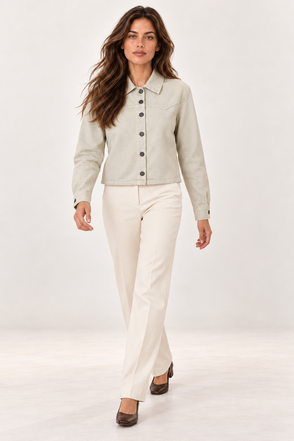 Model walking in the YAYA Sandstone Beige cropped denim jacket