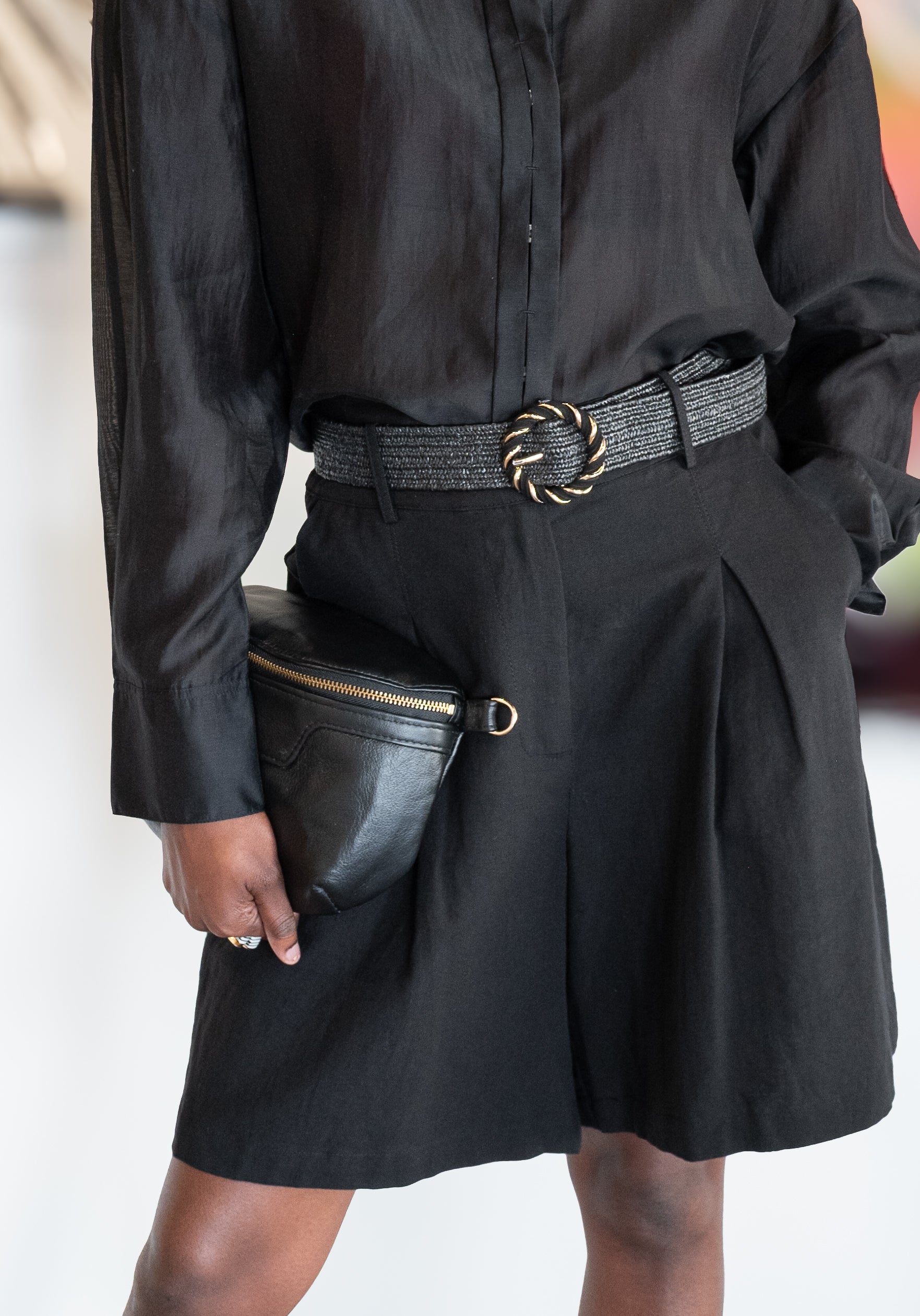 Model wearing Brave + True Eden shorts in black front view