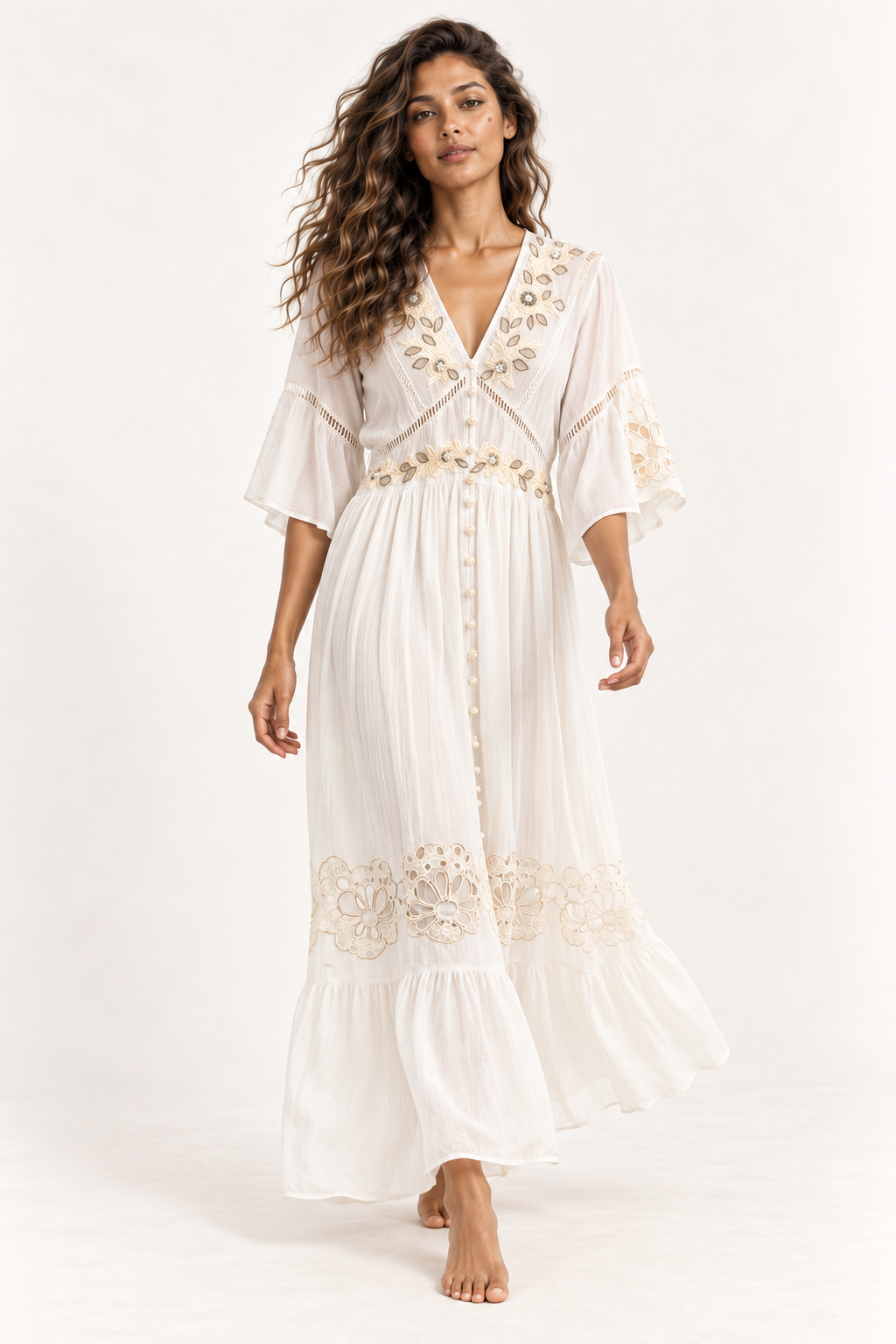 Model wearing the Piti Cuiti gold embroidered button front maxi dress in white, full length front view