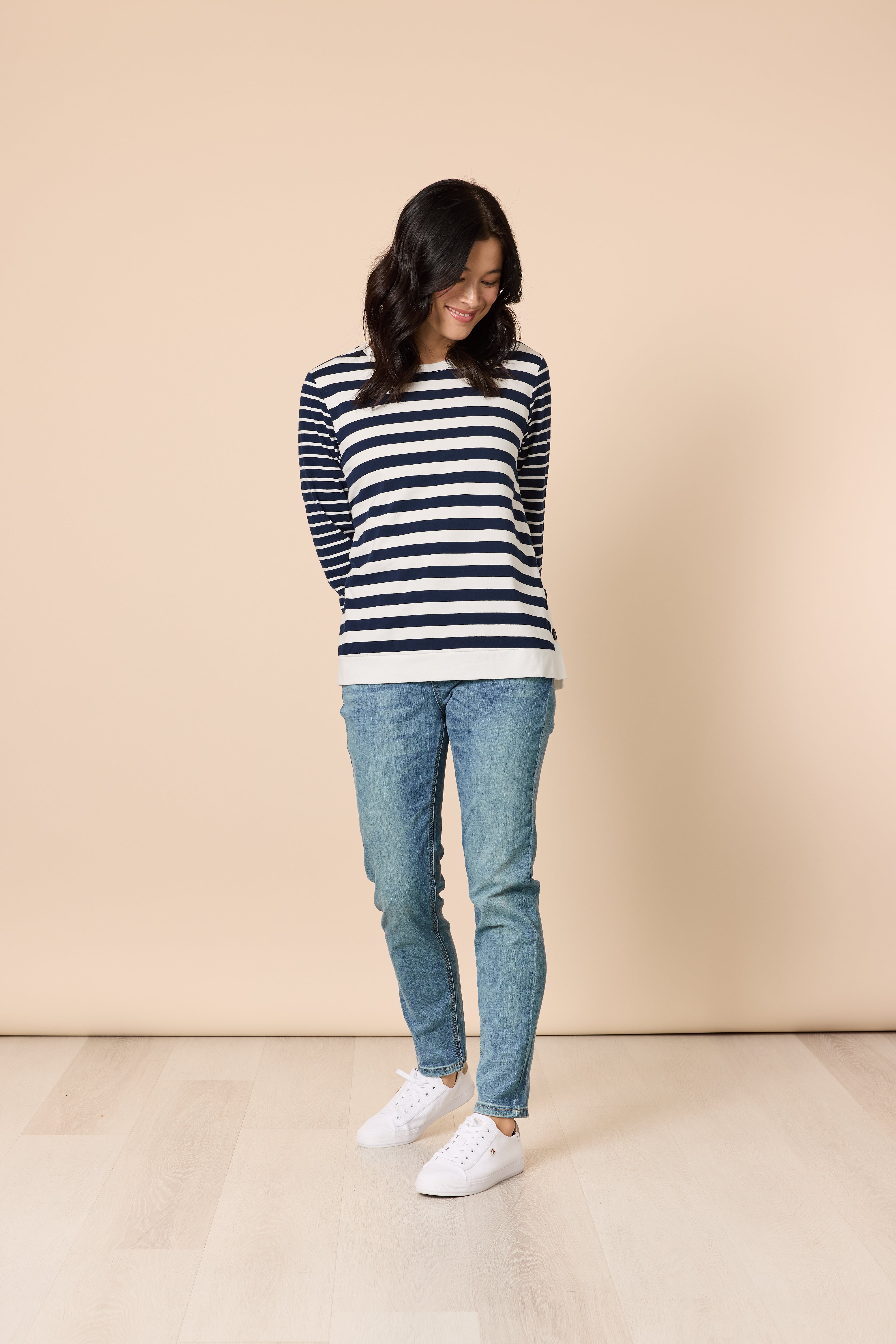 Model wearing Gordon Smith stripe top with denim front view