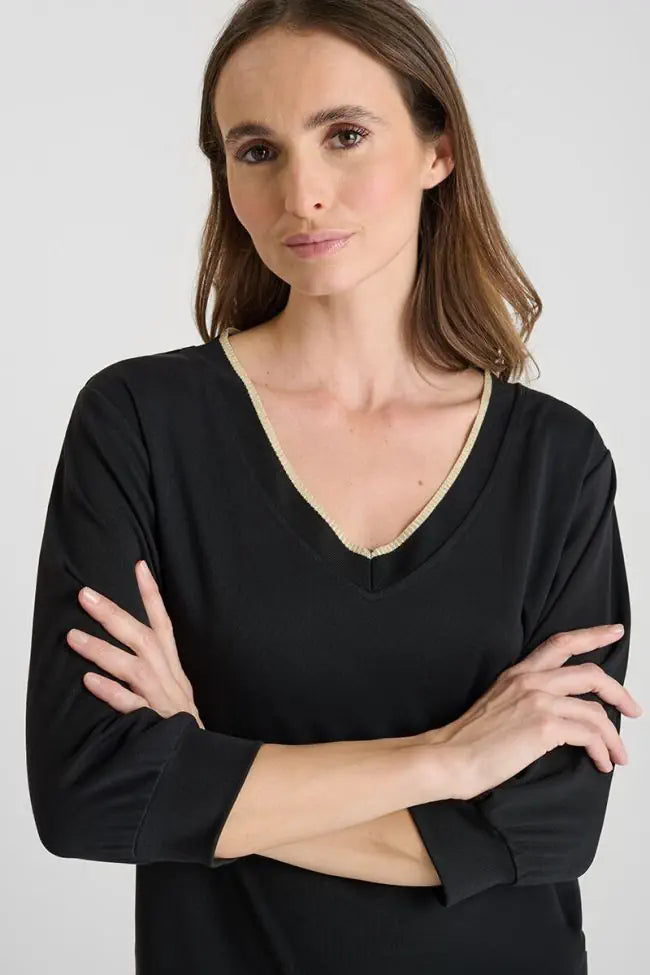 Close-up of Le Temps des Cerises black V-neck tee featuring subtle metallic trim along the neckline