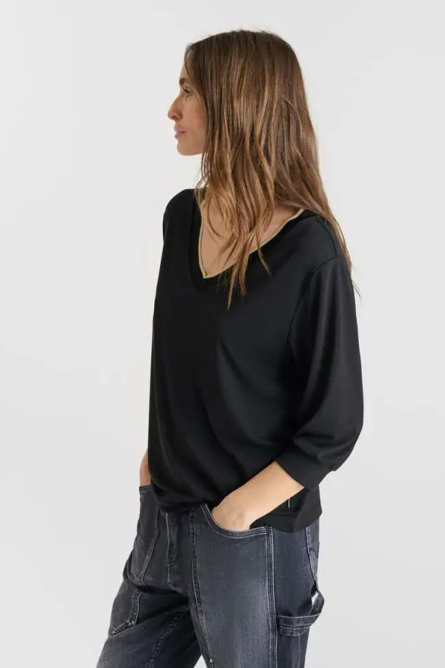 Side profile of Le Temps des Cerises black V-neck tee with relaxed fit and three-quarter sleeves