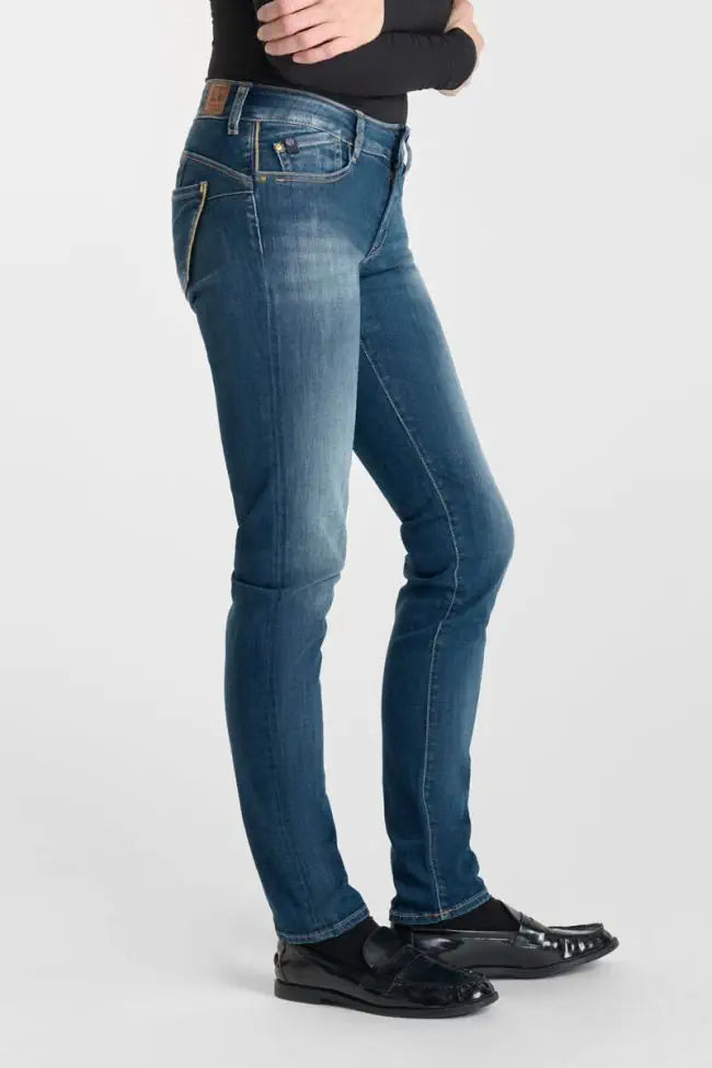 Model wearing the Le Temps des Cerises Pulp Slim Gaba Jeans in Blue N°3, right side profile.