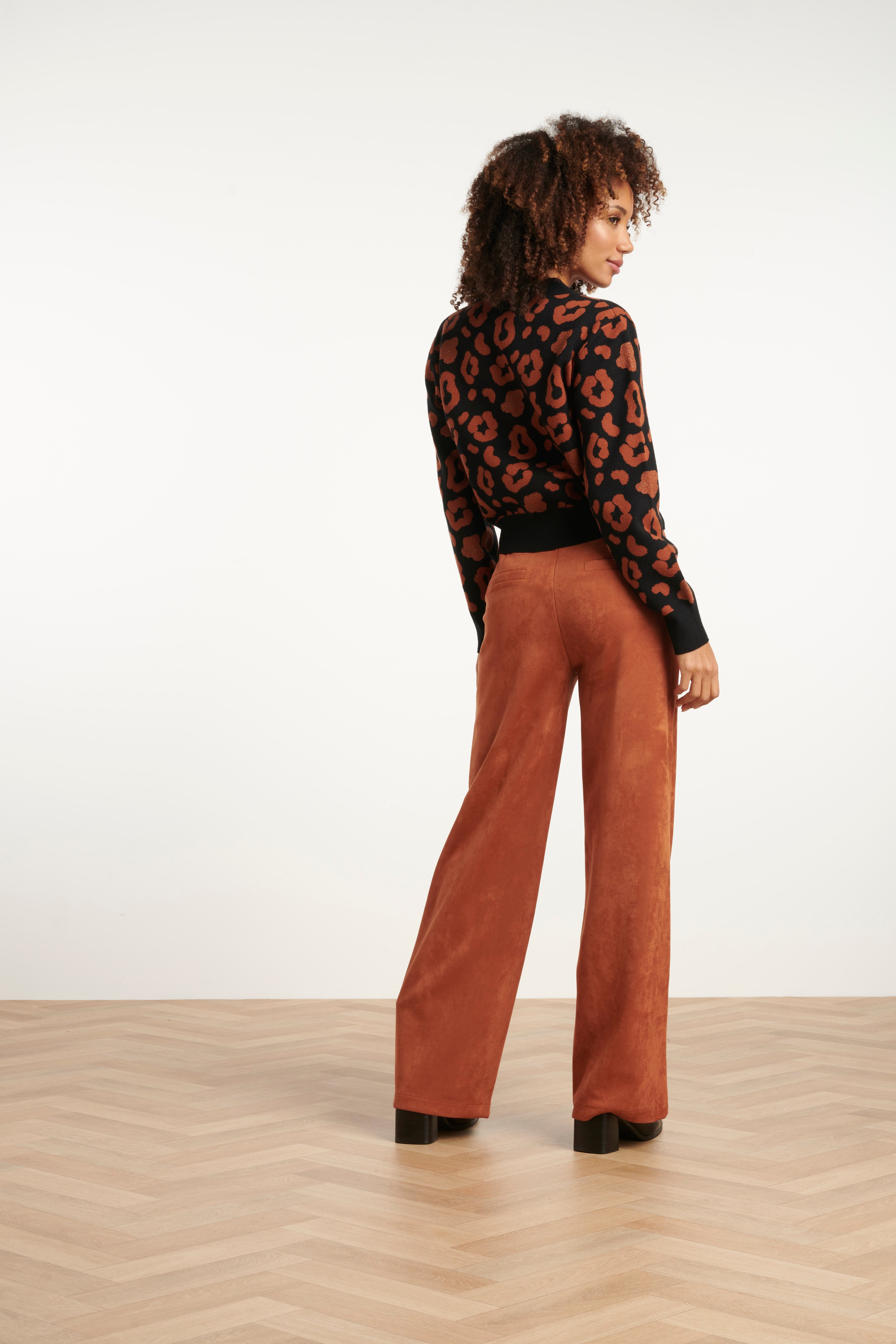 Smashed Lemon button-up knit cardigan in black with cognac leopard print, long sleeves, side view