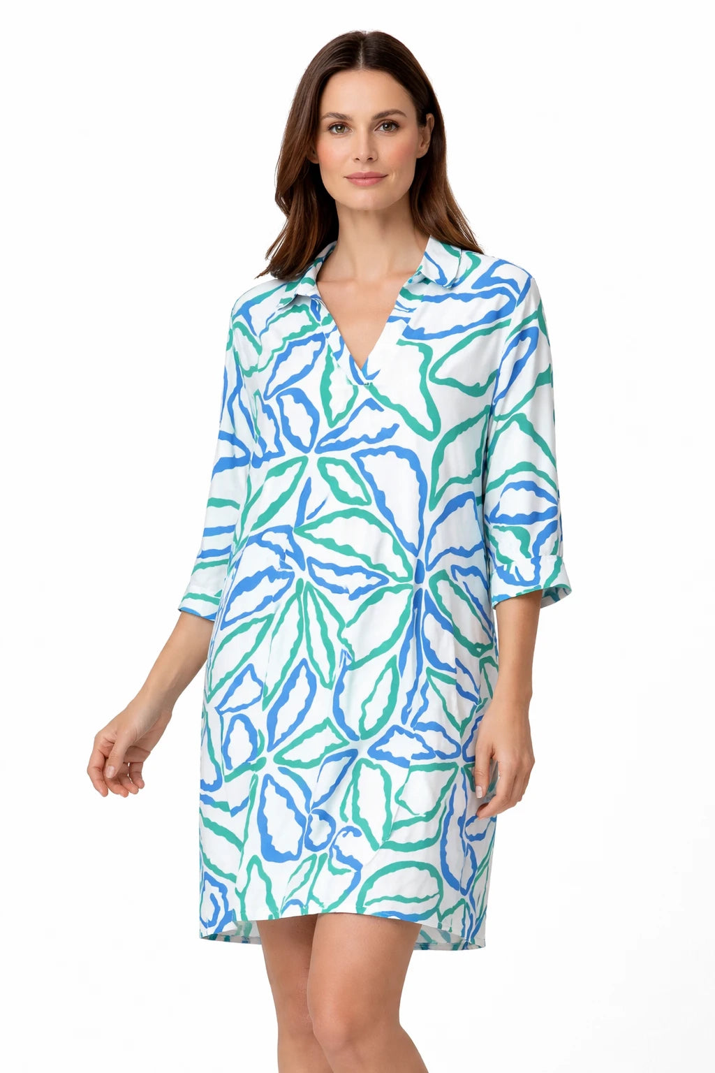 Model wearing Smashed Lemon cobalt blue green printed dress calm pose