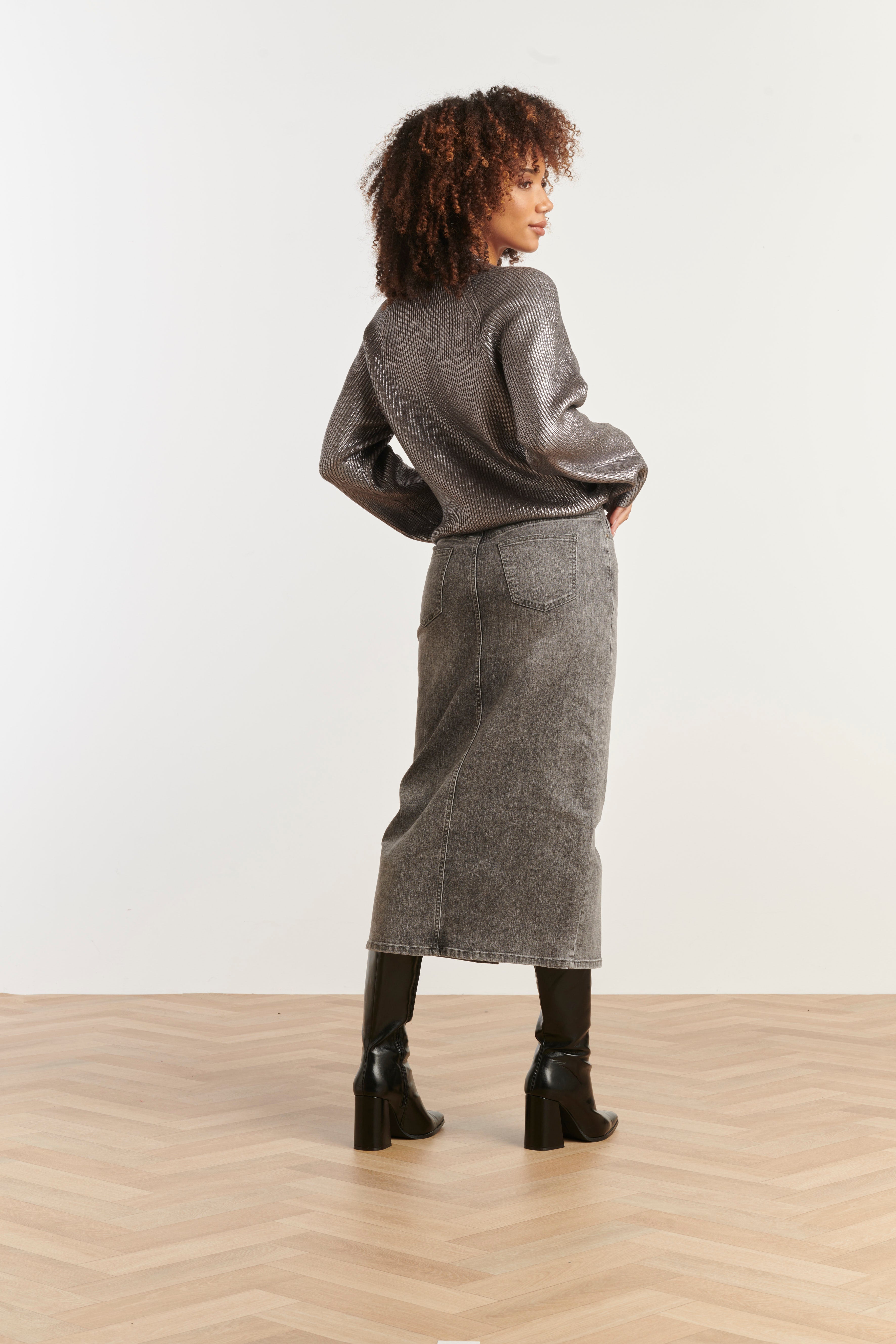 Smashed Lemon ribbed knit top in silver with metallic shimmer, long sleeves and relaxed fit, side view