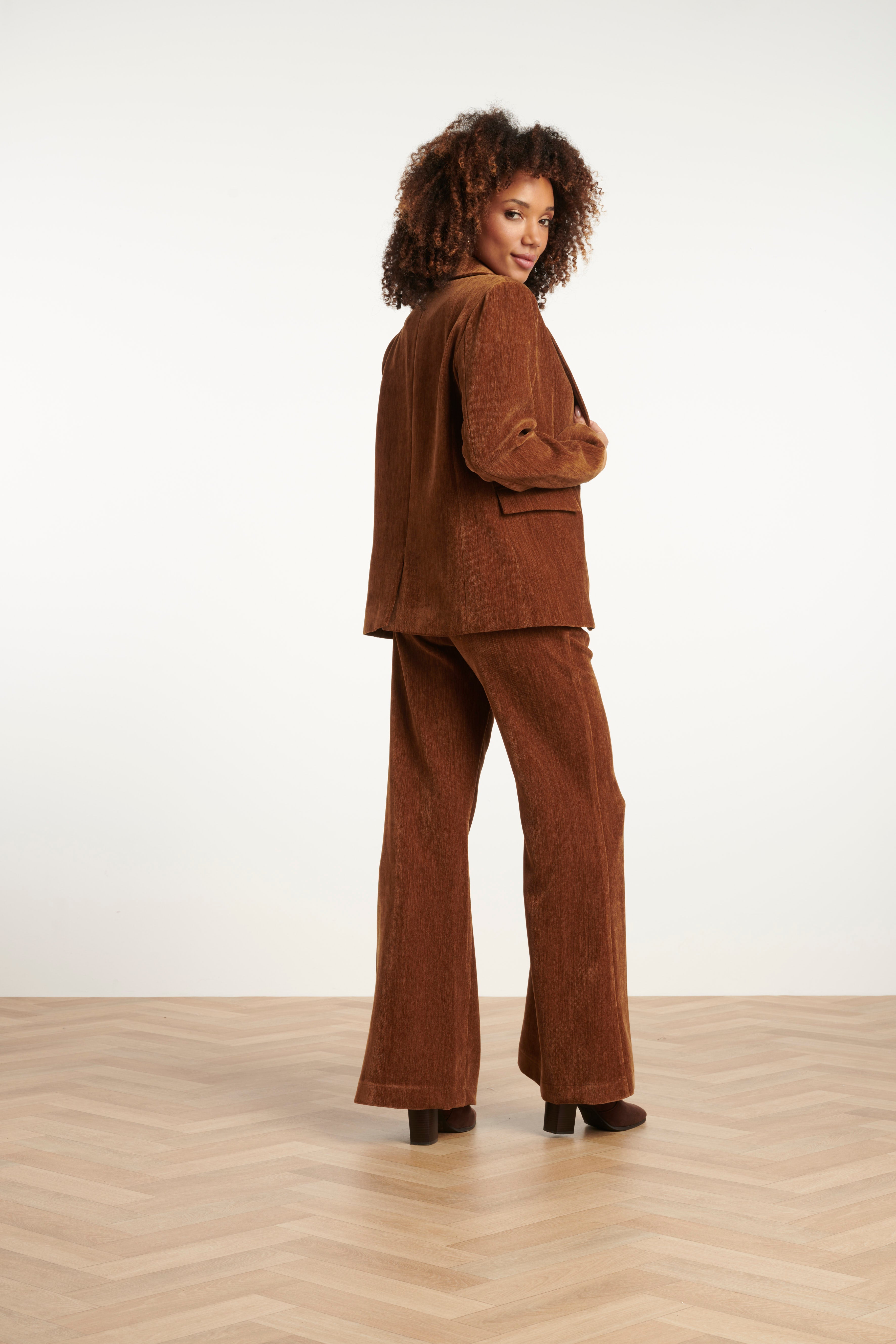 Smashed Lemon velvet blazer in rich brown, tailored silhouette with structured lapels, side view