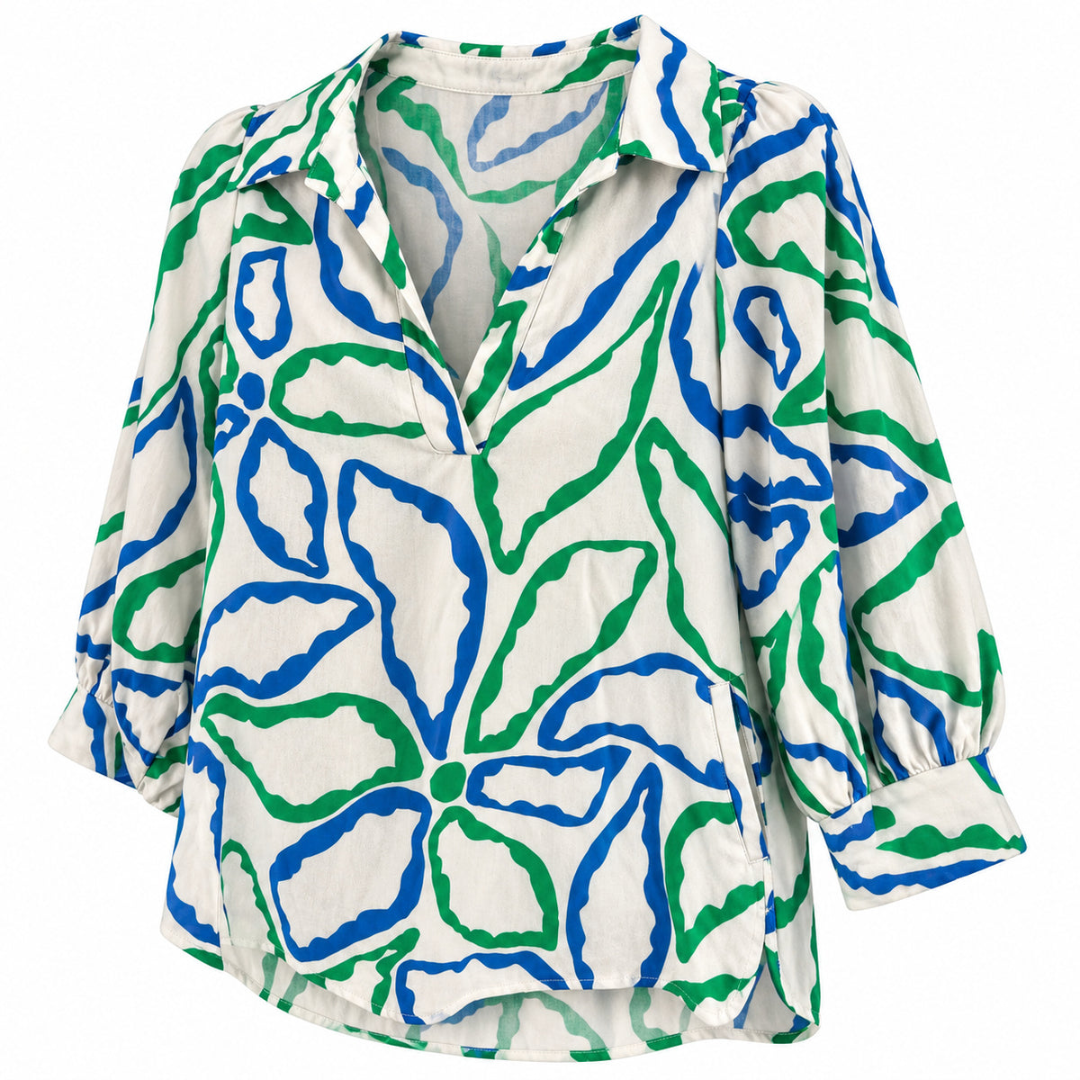 Smashed Lemon cobalt blue and green printed top shown at an angle, showing the gathered cuff and curved back hem