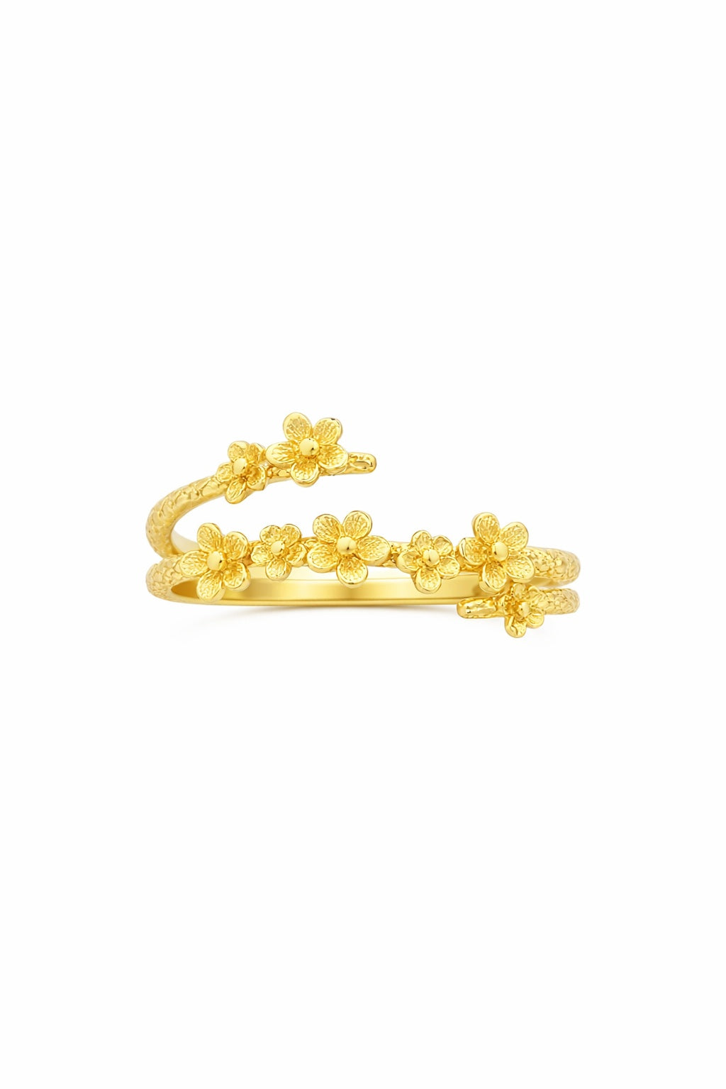 A Jimnojean gold-tone ring featuring a wrap design adorned with multiple small detailed flowers, creating a delicate and elegant floral statement piece.