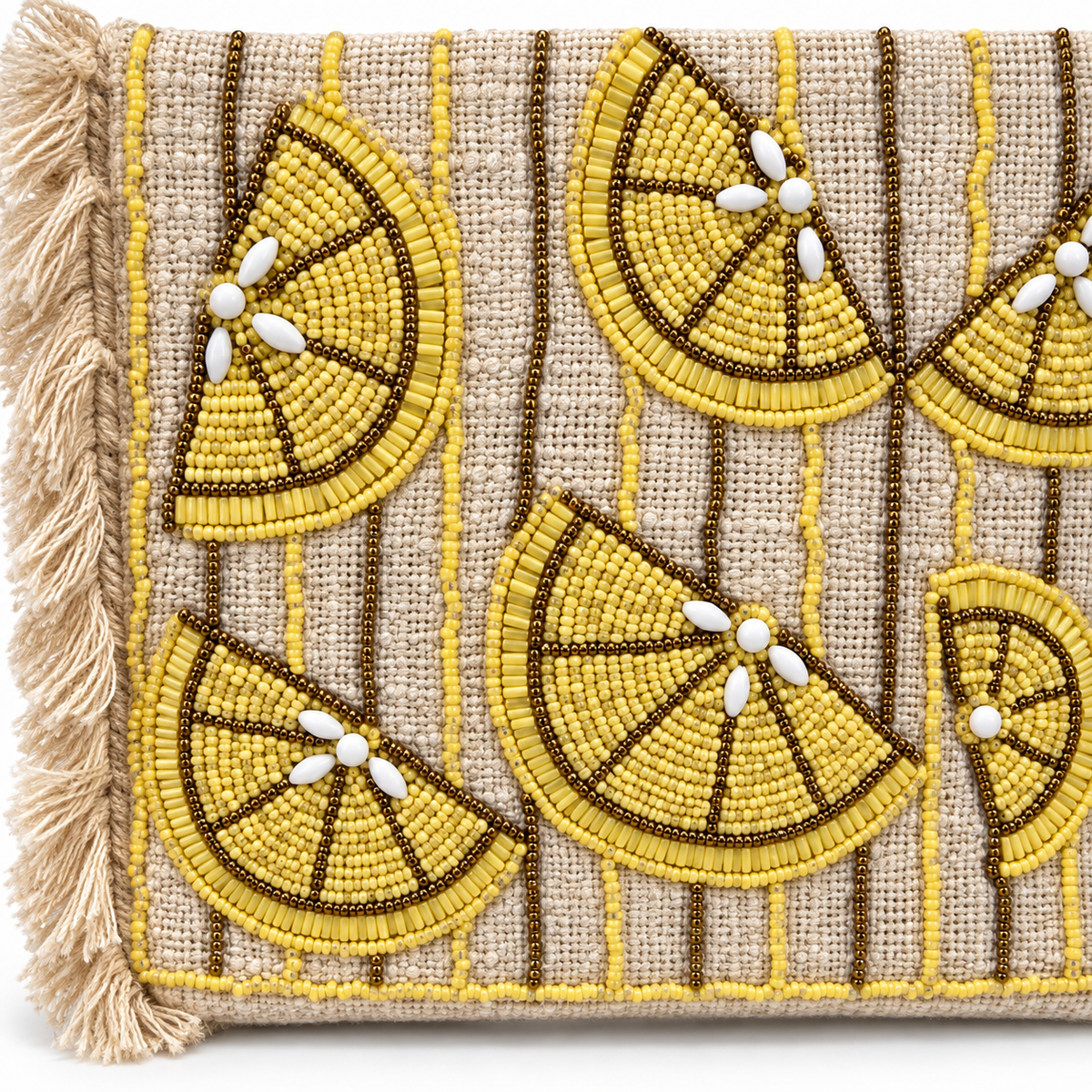 Close up of the beaded lemon halves in yellow seed beads with bronze outlines and white bead pips