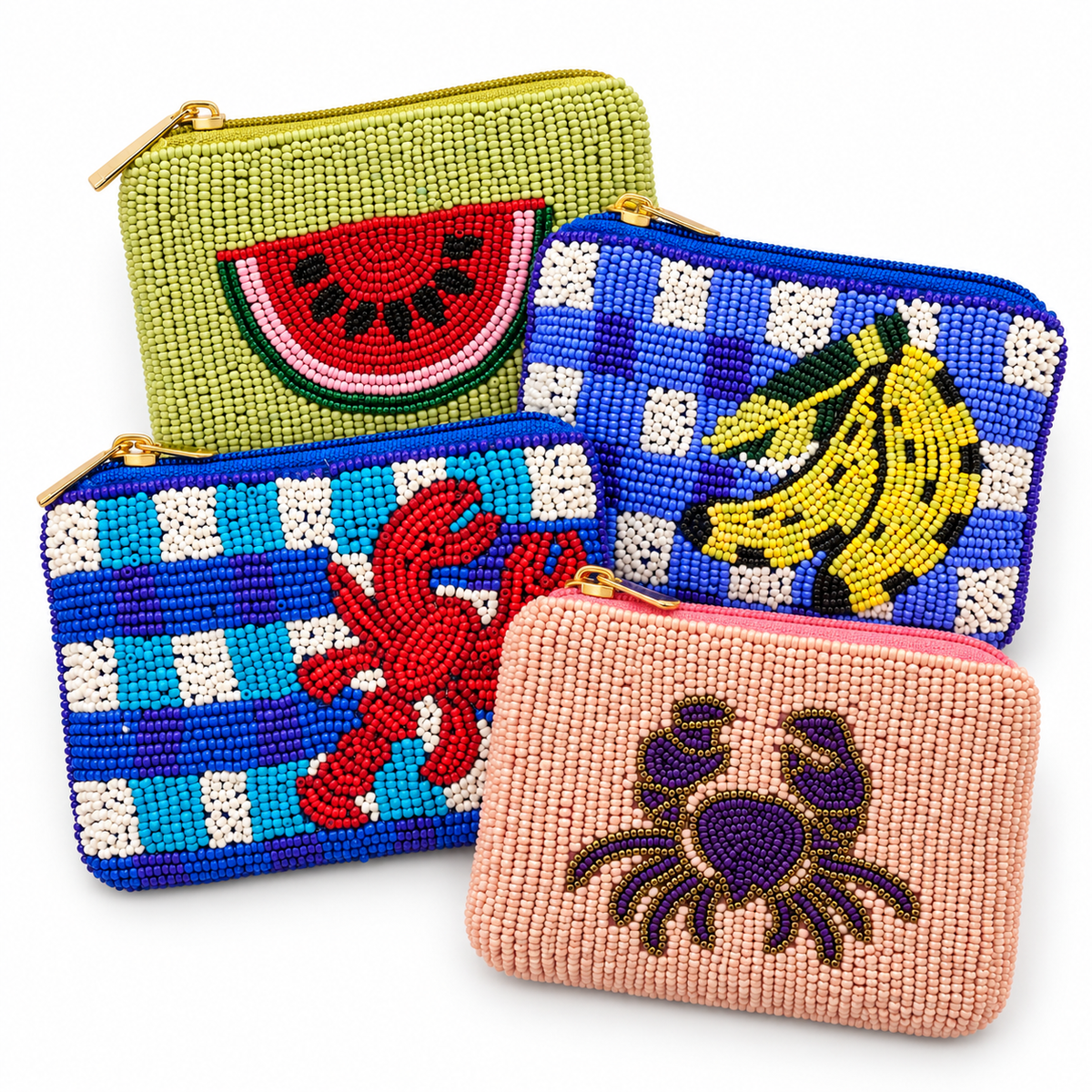 Four Piti Cuiti seed bead mini pouches in watermelon, bananas, lobster and crab patterns with gold zips