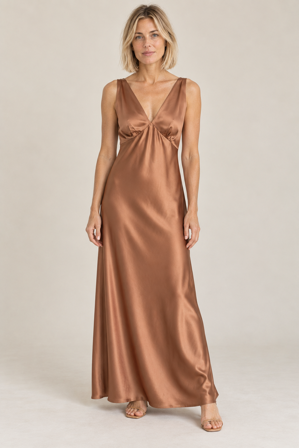 La Petite Étoile Rosily twist back satin midi dress in camel, front view on model