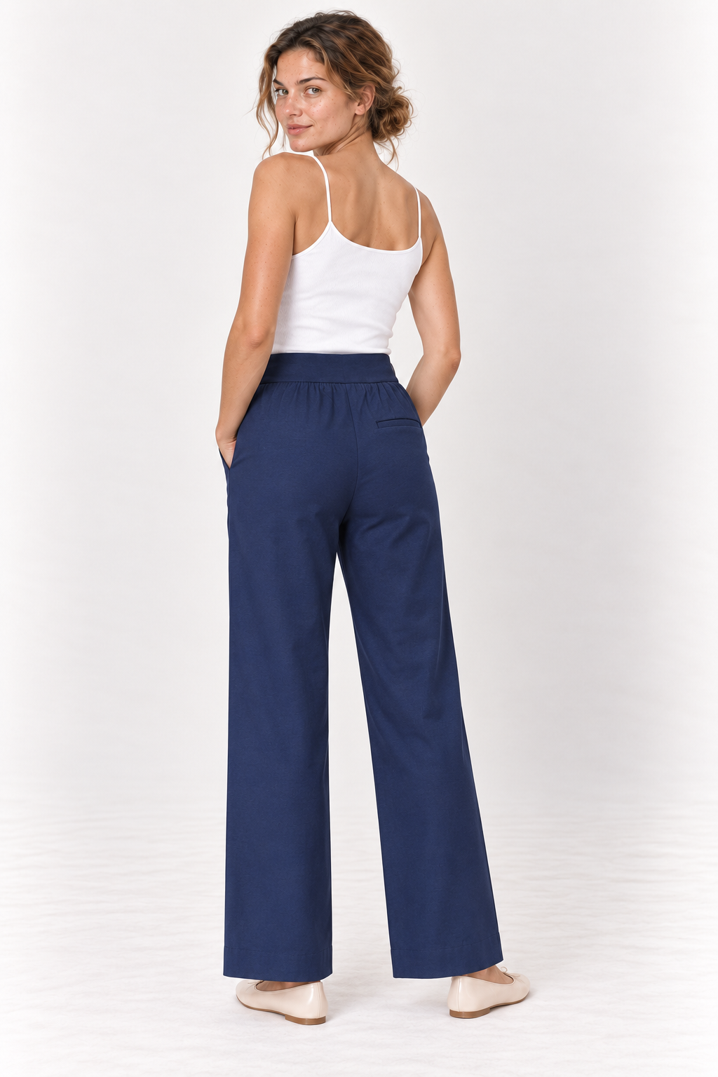 Model wearing the YAYA High Waist Wide Leg Trousers in Navy Blazer Blue, back #Colour_Navy Blazer Blue