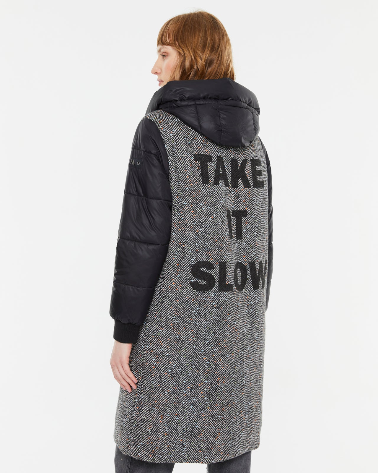 Andam black mixed fabric long parka with quilted sleeves and hood