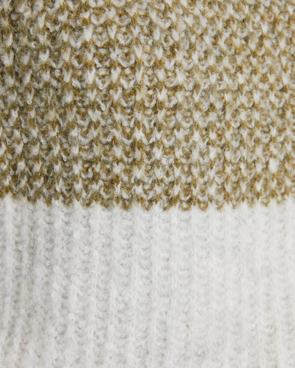 Detailed close-up of the soft textured knit fabric on the Andam colour block jumper in khaki and cream.