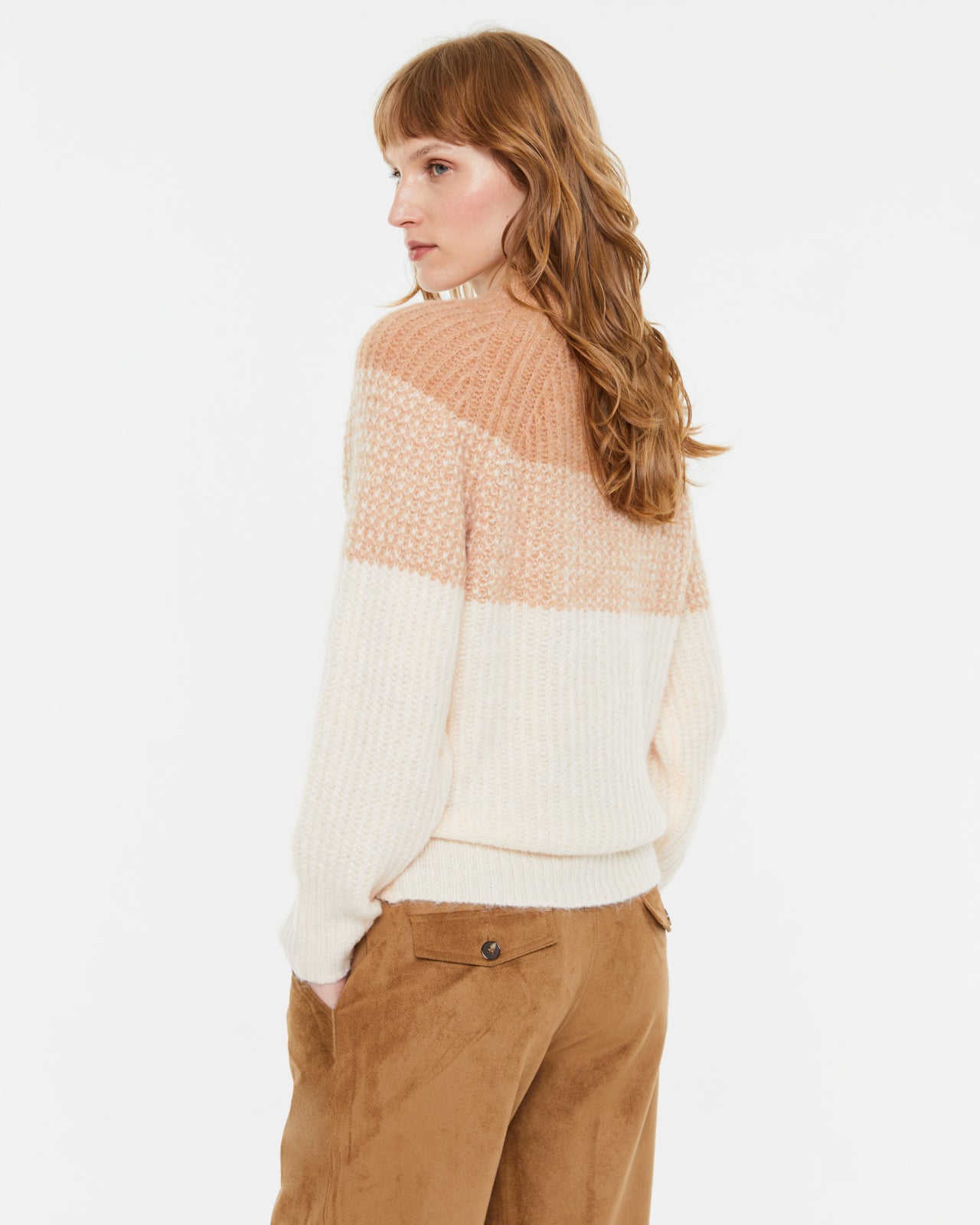 Detail of Andam colour block knit texture in peach and cream