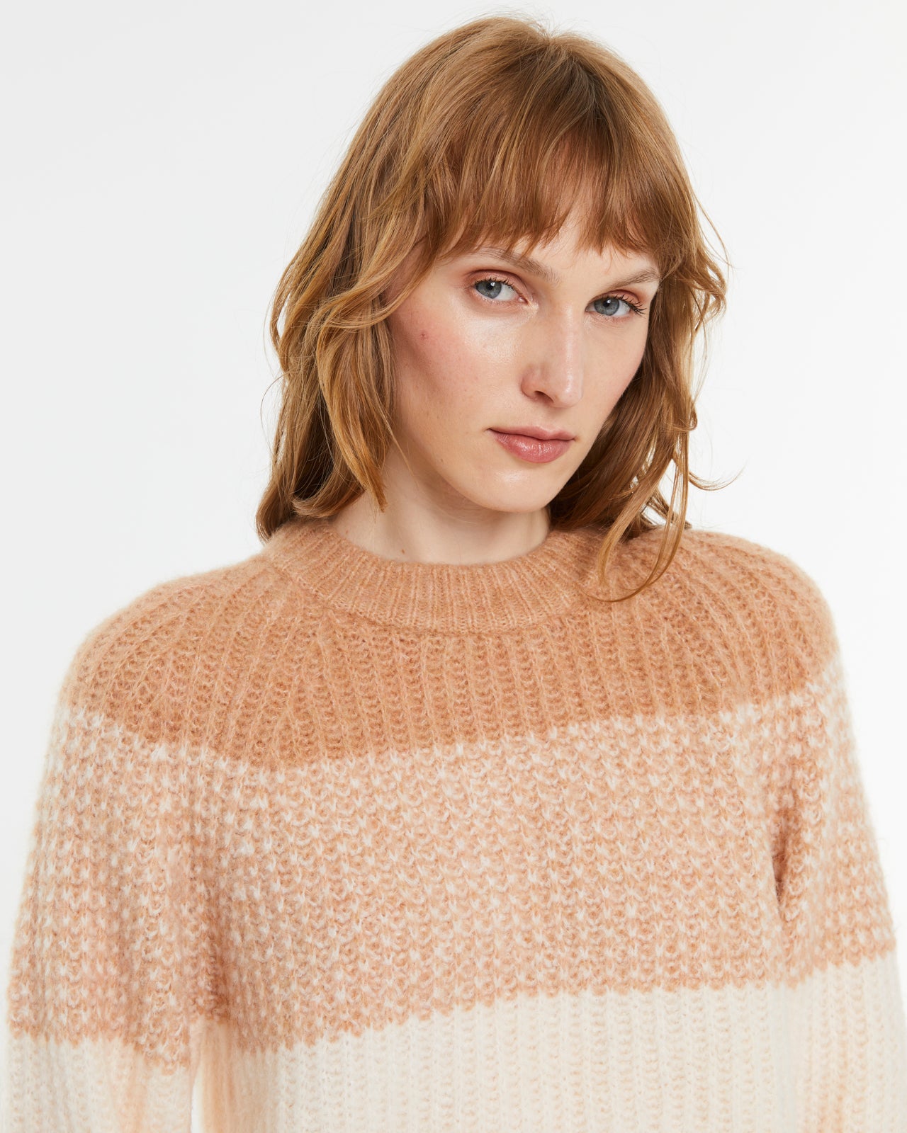 Andam peach cream knit sweater profile picture on model