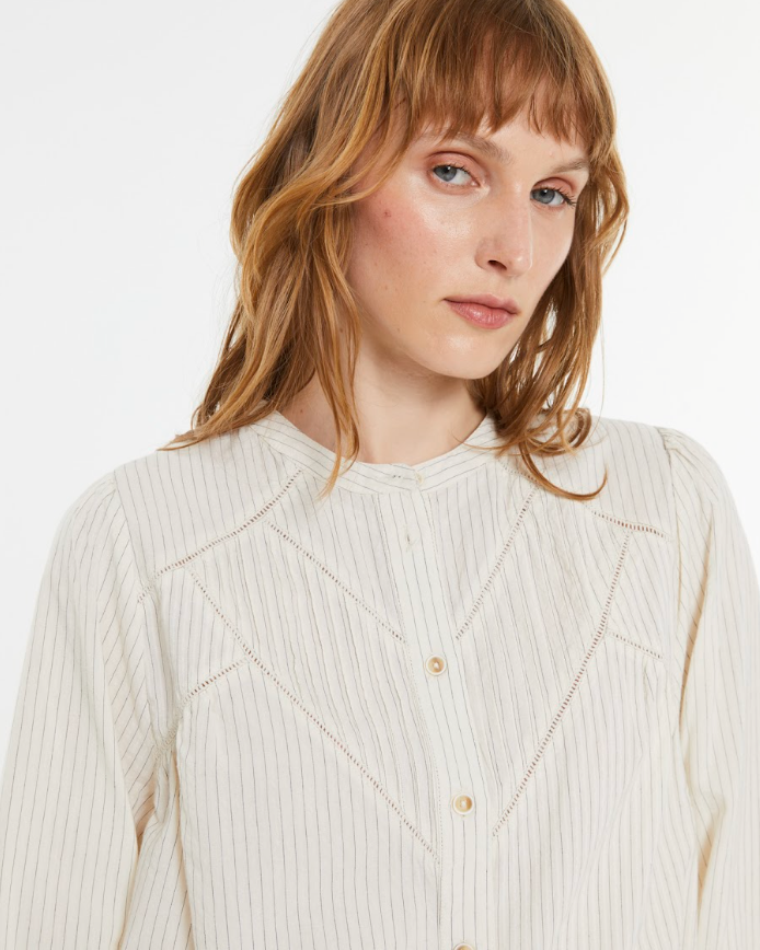 Detail of Andam ecru blouse with delicate vertical stripe texture