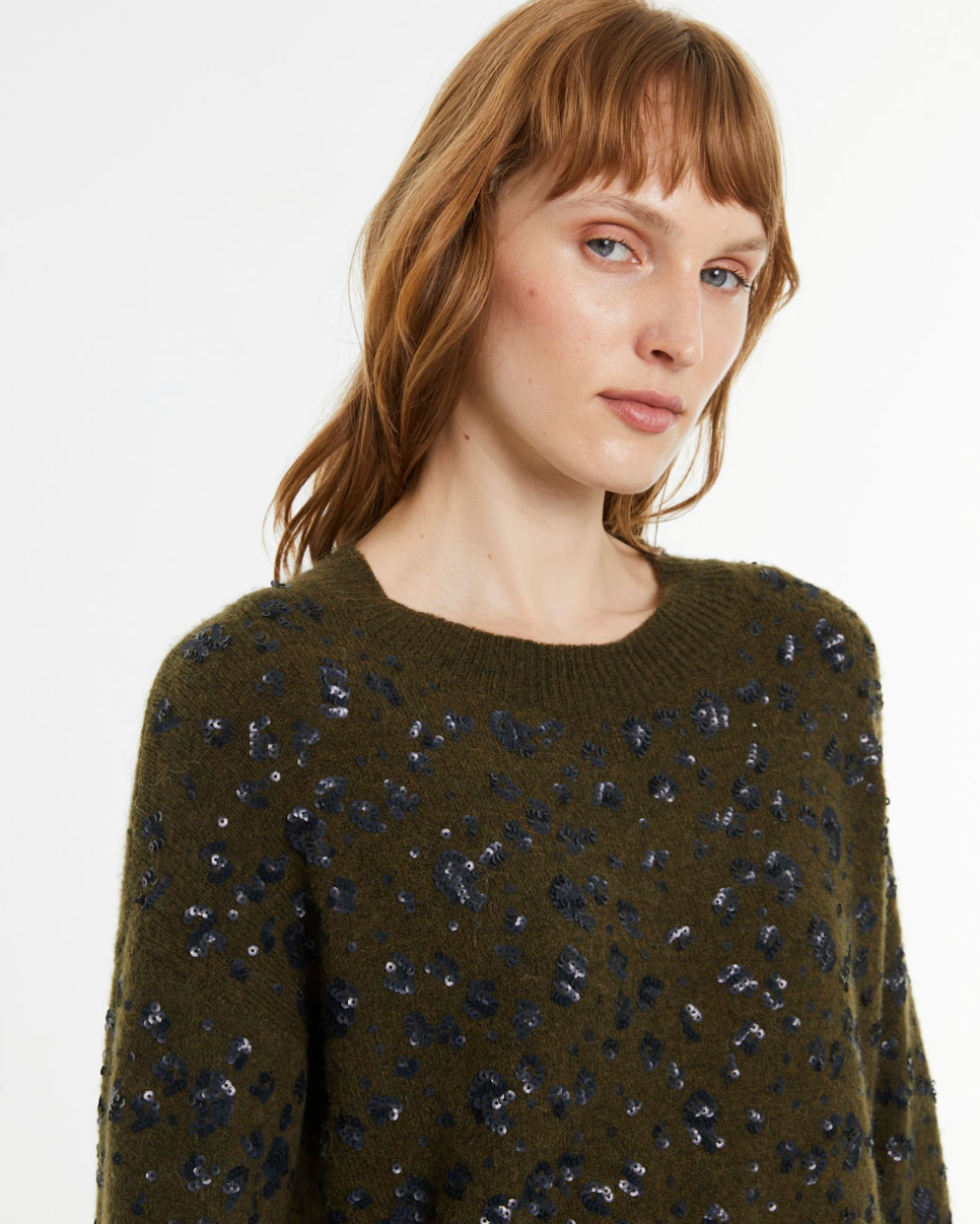 Close-up of the Andam khaki knit jumper showcasing the black sequin embellishment and soft textured knit fabric.