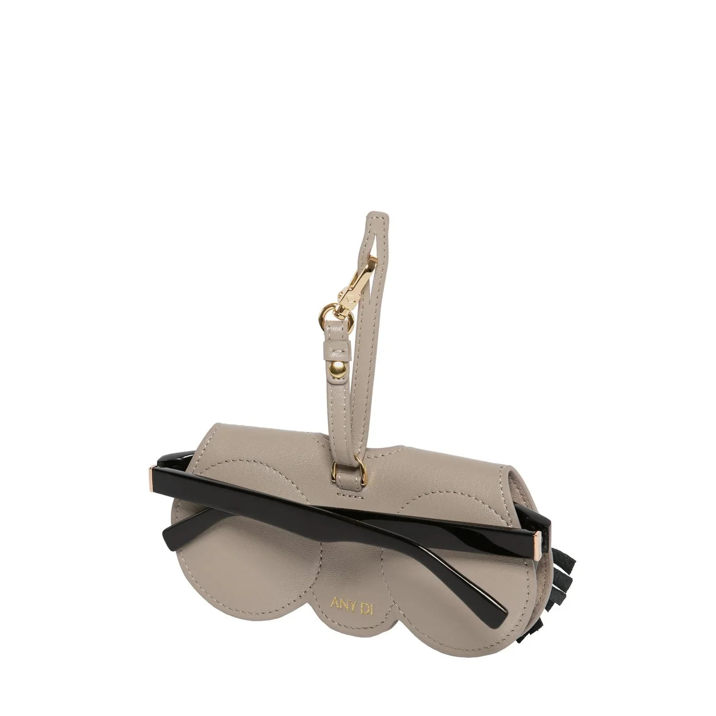 ANY DI Flirty Lashes SunCover sunglasses case with eyelash detailing and gold hardware
