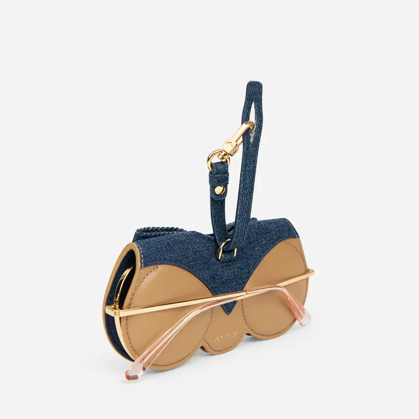 ANY DI Ribbon SunCover sunglasses case with denim-inspired bow detail
