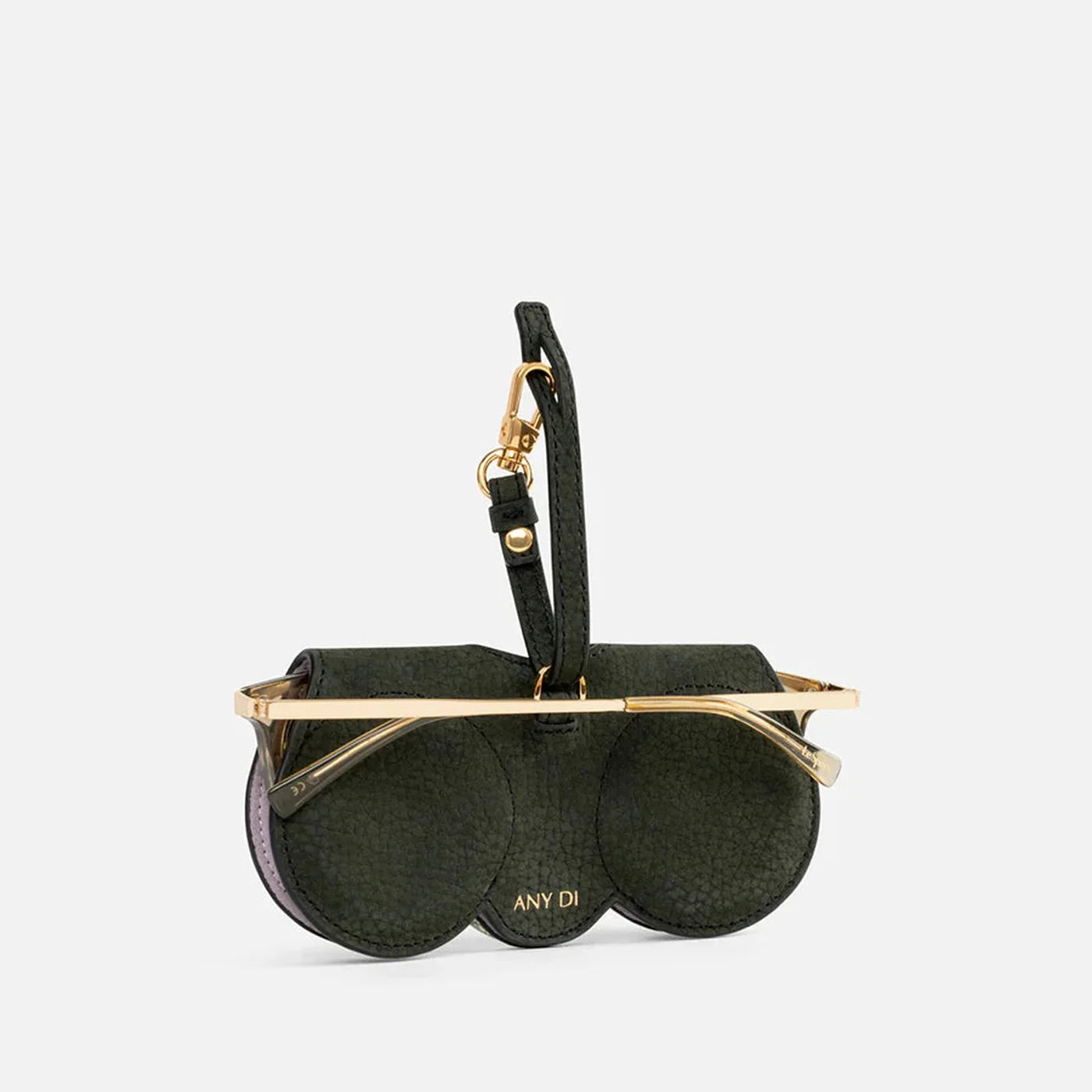 Back view of the ANY DI SunCover in Scarabeus with premium leather finish, gold hardware and sunglasses securely attached.