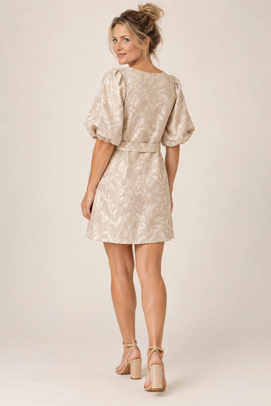 Back view of the Smashed Lemon leaf print puff sleeve dress on a model