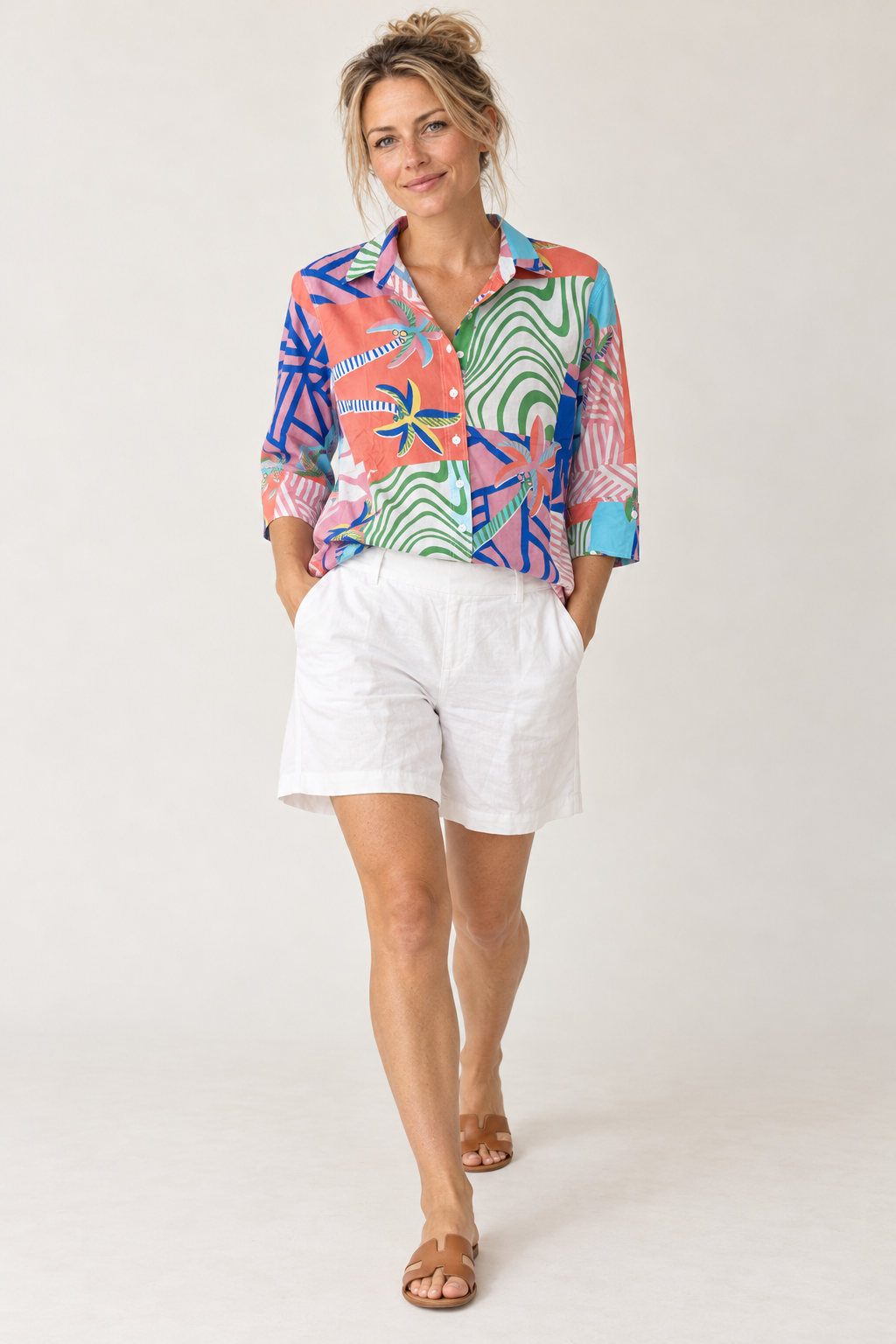 Model walking in the Gordon Smith Lino Short in White and Threadz Urban Jungle Print Shirt