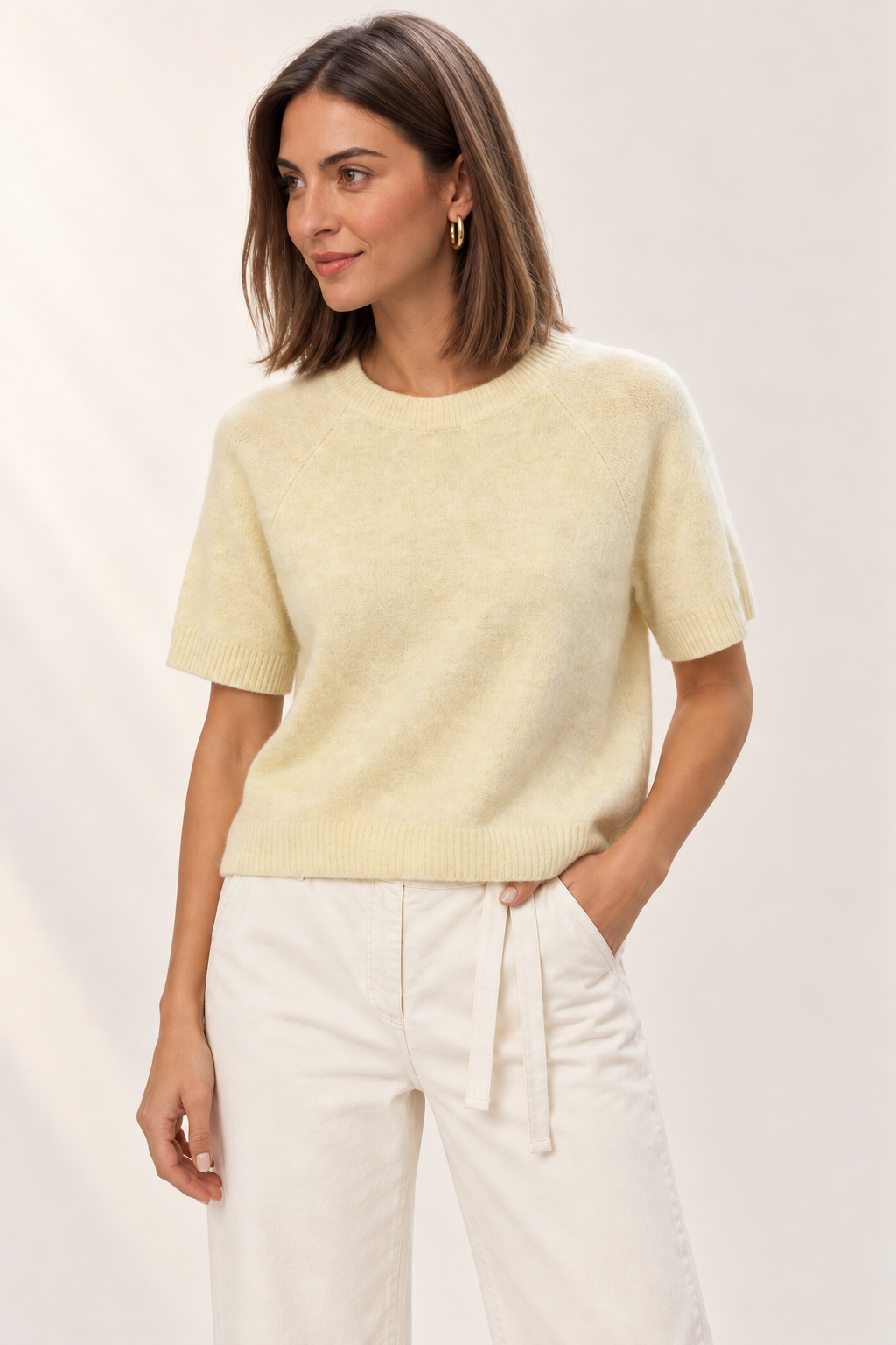 Close-up of the YAYA Raglan Short Sleeve Knit in Reed Yellow Melange showing the soft melange yarn