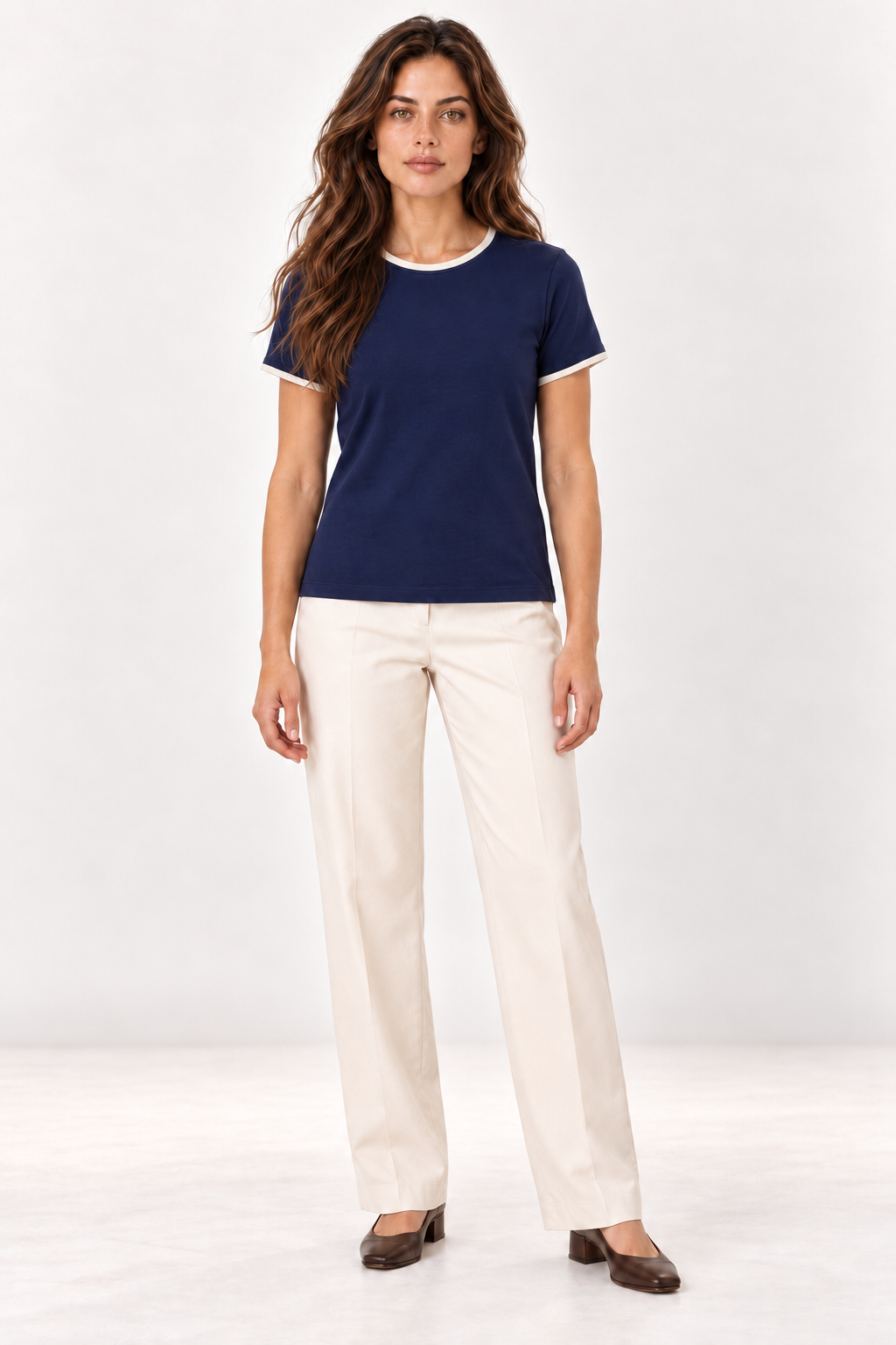 Model wearing the YAYA navy T-shirt with white contrast binding, full length front