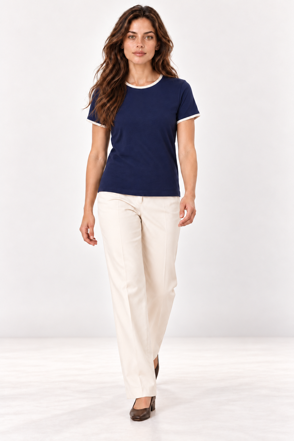 Model walking in the YAYA Navy Blazer Blue T-shirt with contrast binding