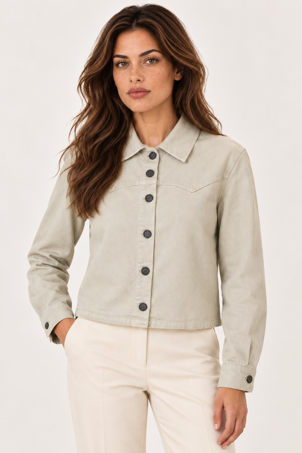 Close-up of the YAYA Sandstone Beige denim jacket on the model, showing the collar and dark buttons
