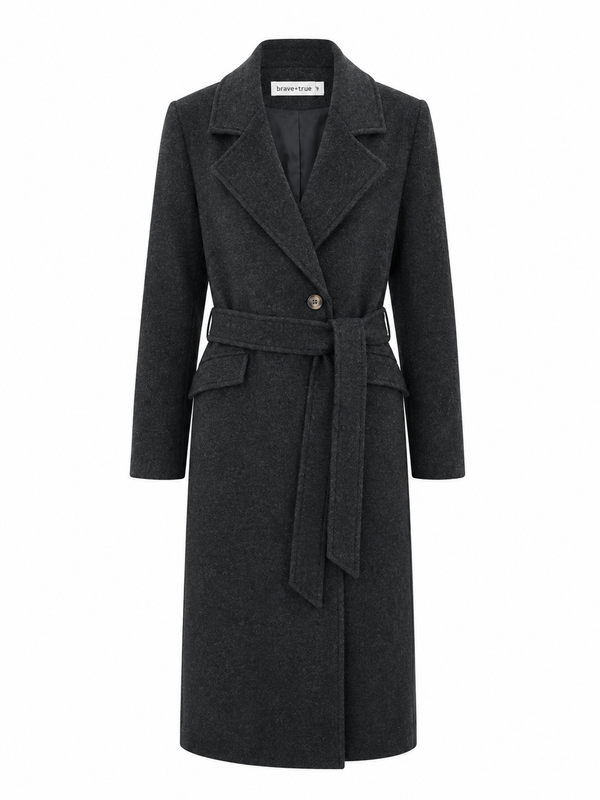 Front view of the Brave & True Julianne Coat in Charcoal featuring a tailored longline silhouette, belted waist, wide lapel collar and single-button closure.