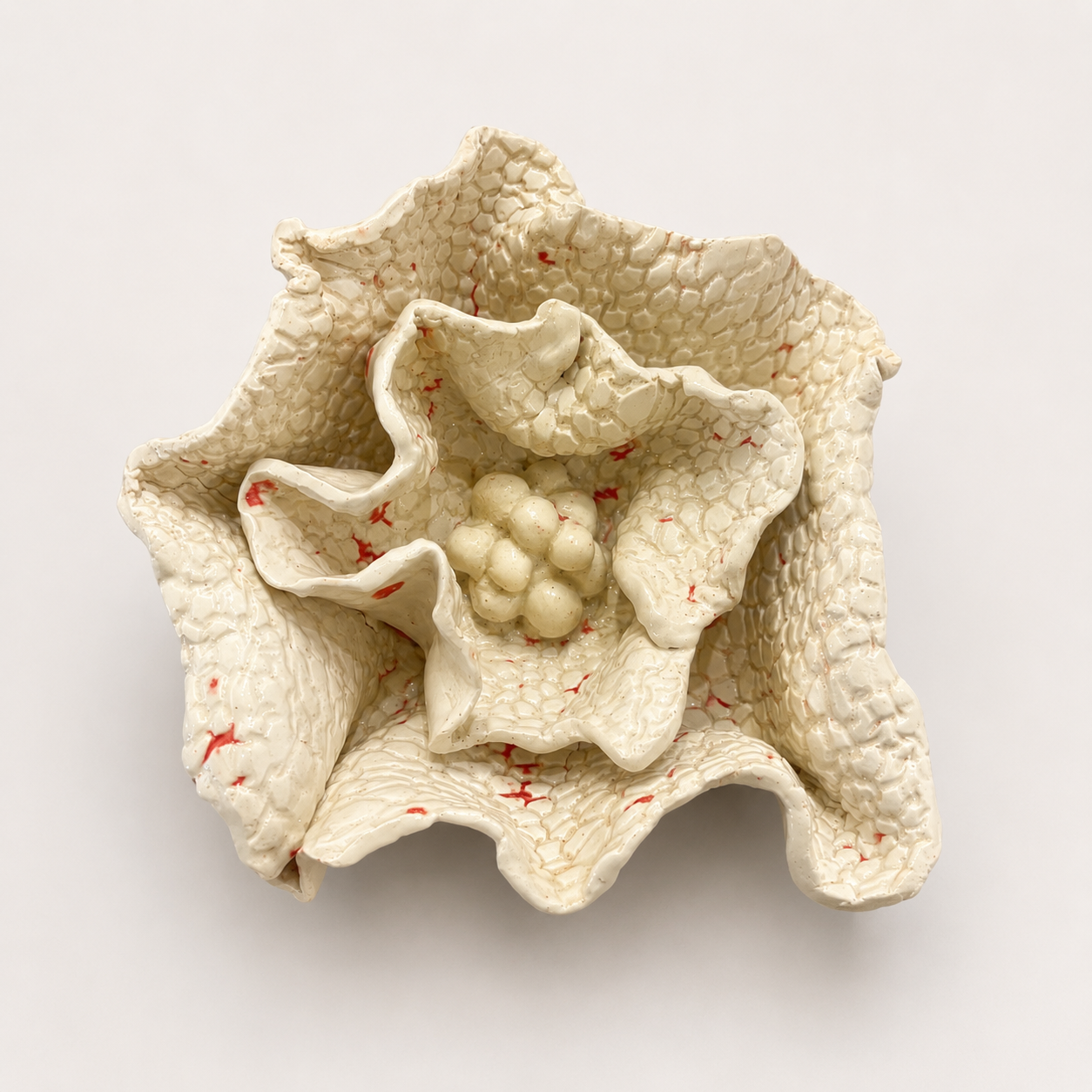 Handcrafted Floral Fragments stoneware wall art by Ilené Bothma featuring layered floral-inspired forms, textured ceramic surfaces and sculptural organic detailing.