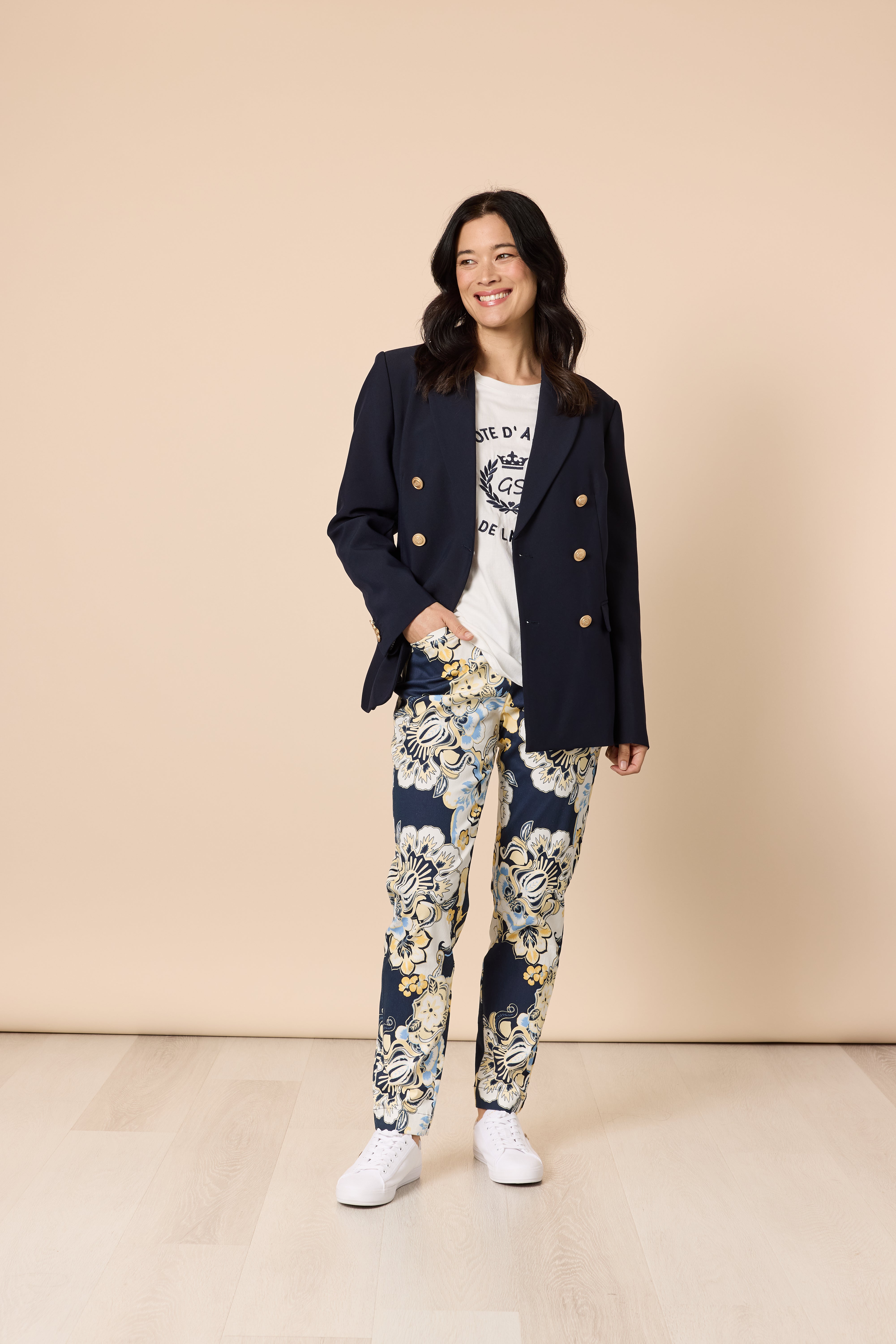 Model wearing Gordon Smith Newport print pants with navy blazer