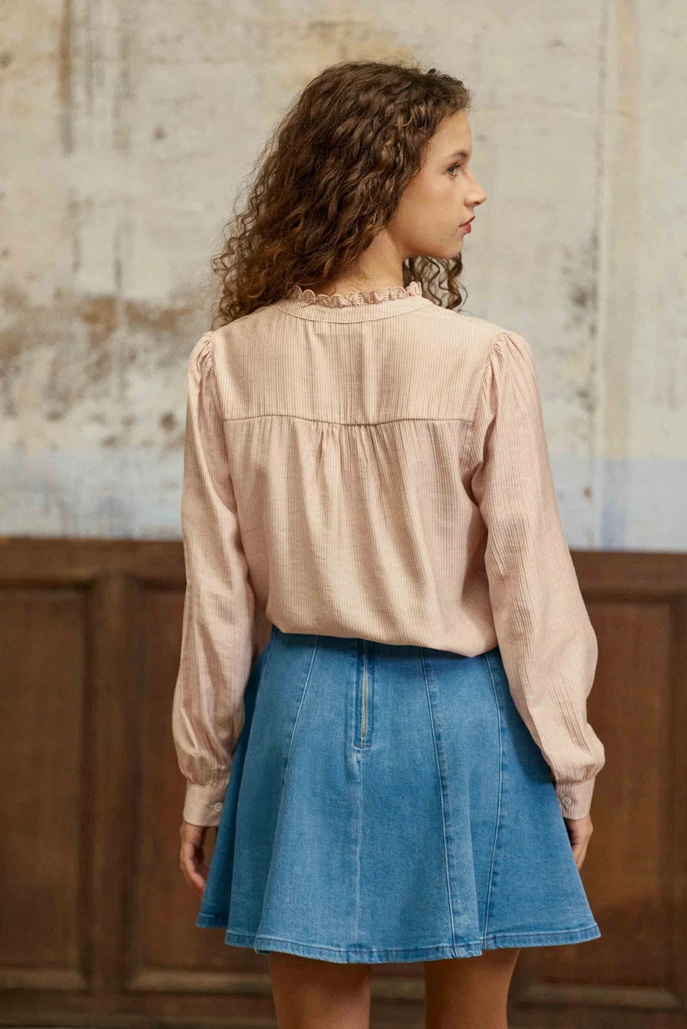 La Petit Étoile Boya blouse in powder back view with gathered yoke and ruffled collar