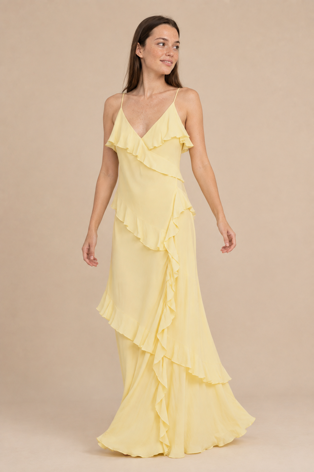 La Petit Étoile Rosilda ruffle slip dress in yellow worn by a model, in motion — Boetiek, Cape Town