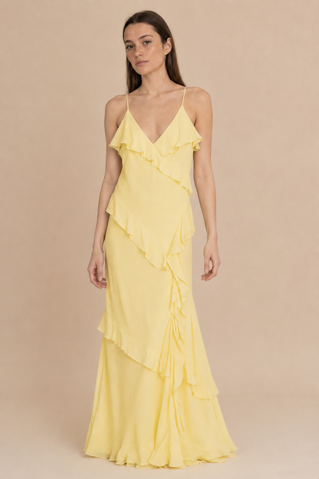 La Petit Étoile Rosilda ruffle slip dress in yellow worn by a model, standing — Boetiek, Cape Town