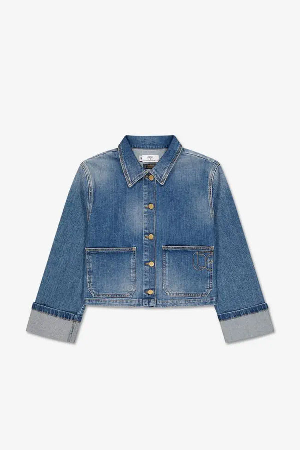 Le Temps des Cerises Aleska cropped blue denim jacket with oversized patch pockets and button front.