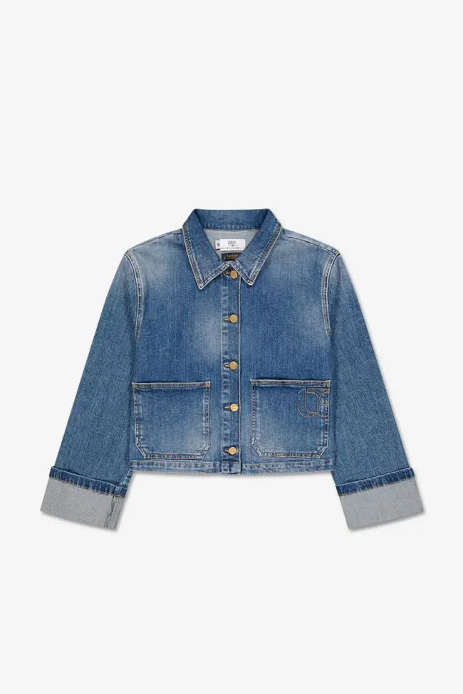 Le Temps des Cerises Aleska cropped blue denim jacket with oversized patch pockets and button front.