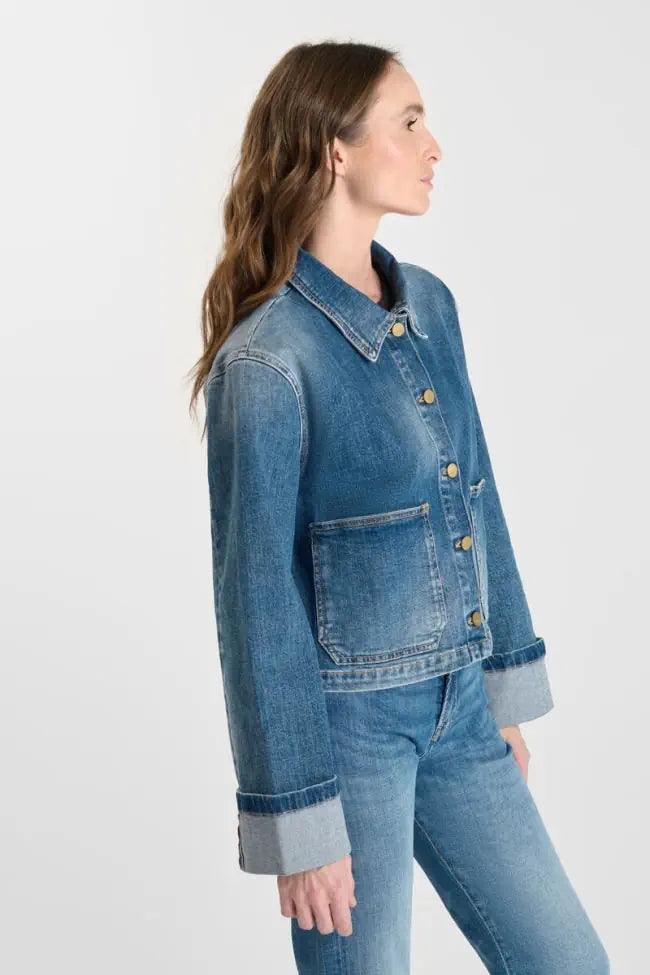 Side view of the Le Temps des Cerises Aleska blue denim jacket on model.