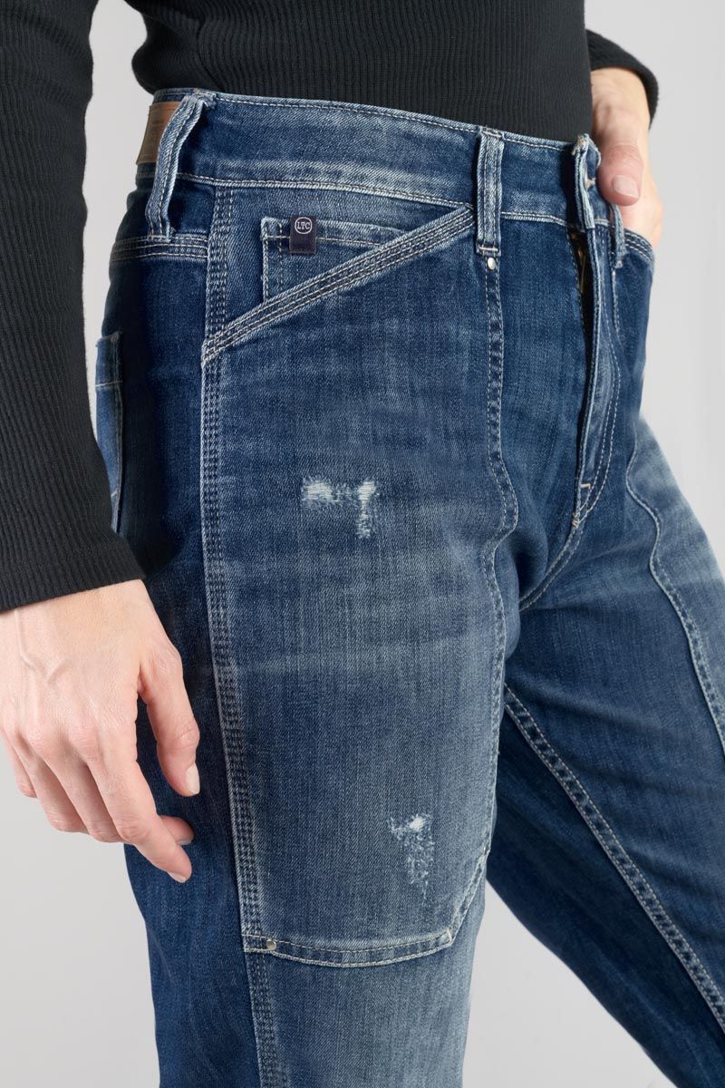 Close-up of front pocket construction and faded blue wash on Le Temps des Cerises Girlfriend Union jeans